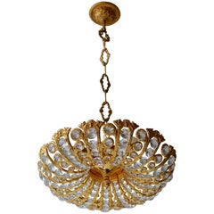 Lampadario Hollywood Regency in cristallo e dorato di Palwa