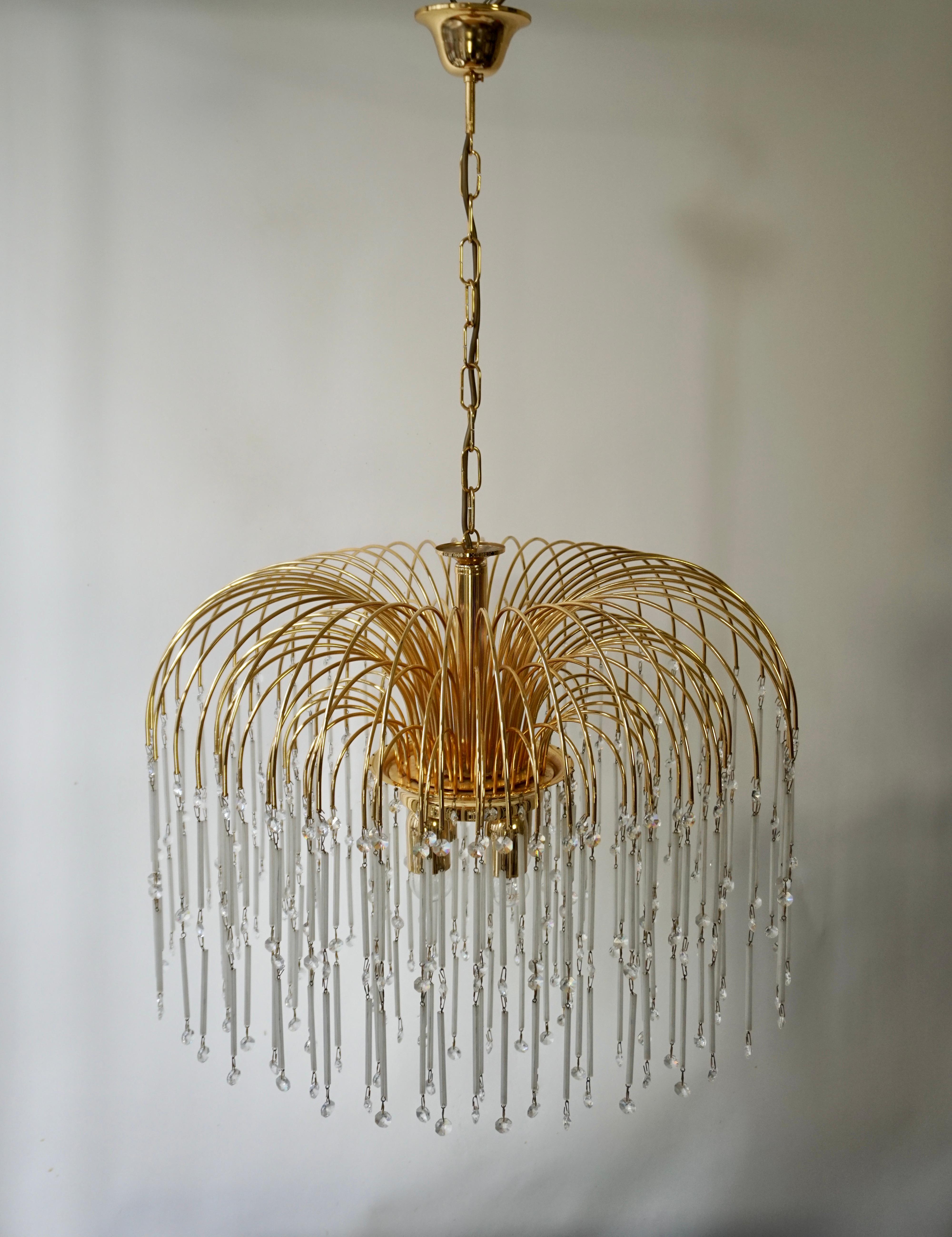 Laiton Lustre en cascade en cristal taillé Hollywood Regency en vente