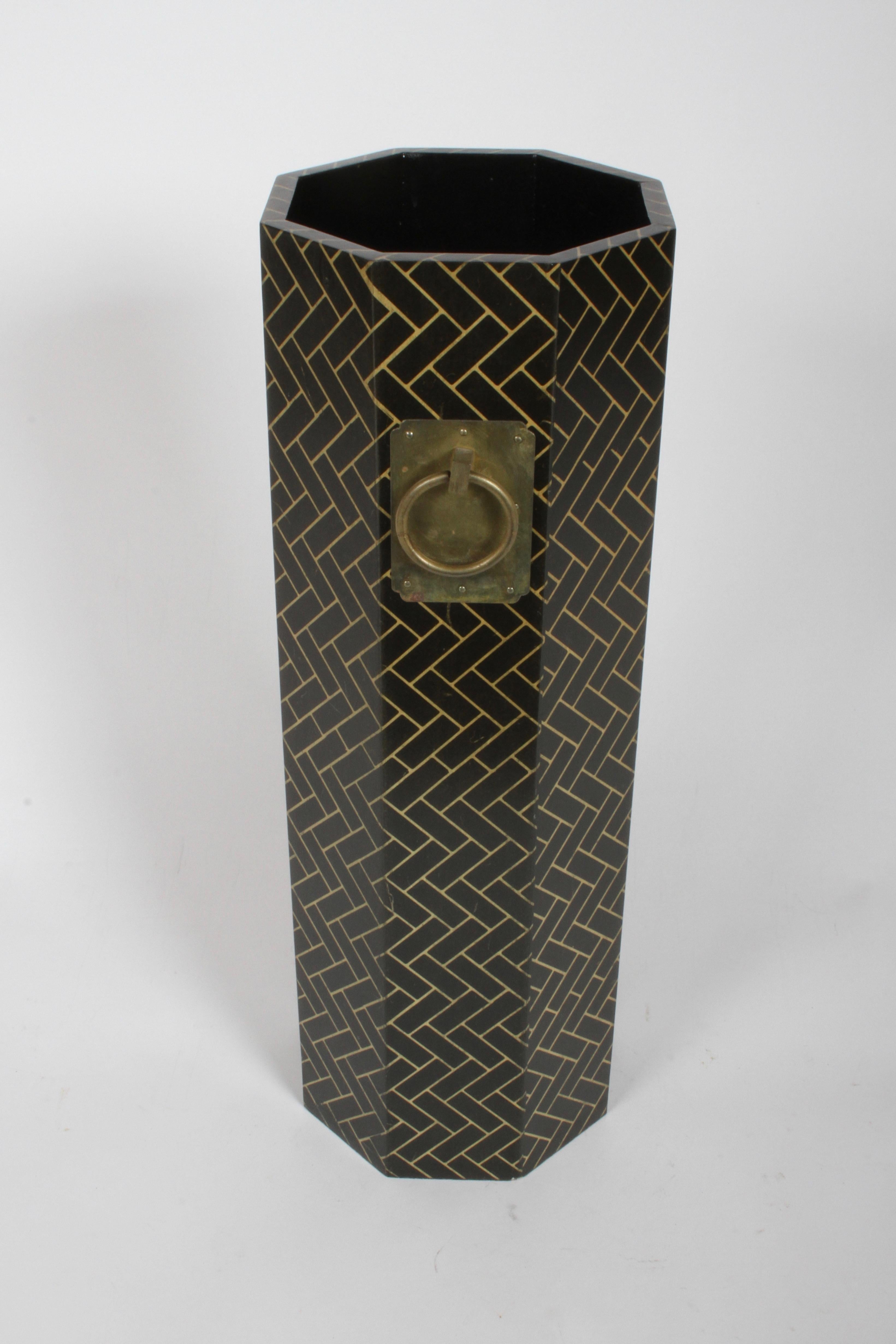 Late 1970s David Hicks influenced gold and black geometric patterned octagon form umbrella or cane stand with brass Asian style ring handles. In very nice original condition, some light scuffs.