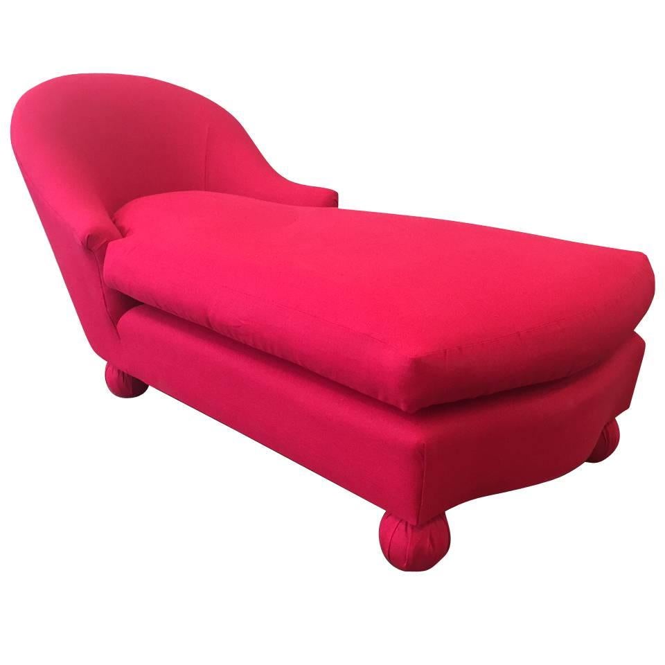 Hollywood Regency daybed or chaise lounge upholstered in dark pink linen.