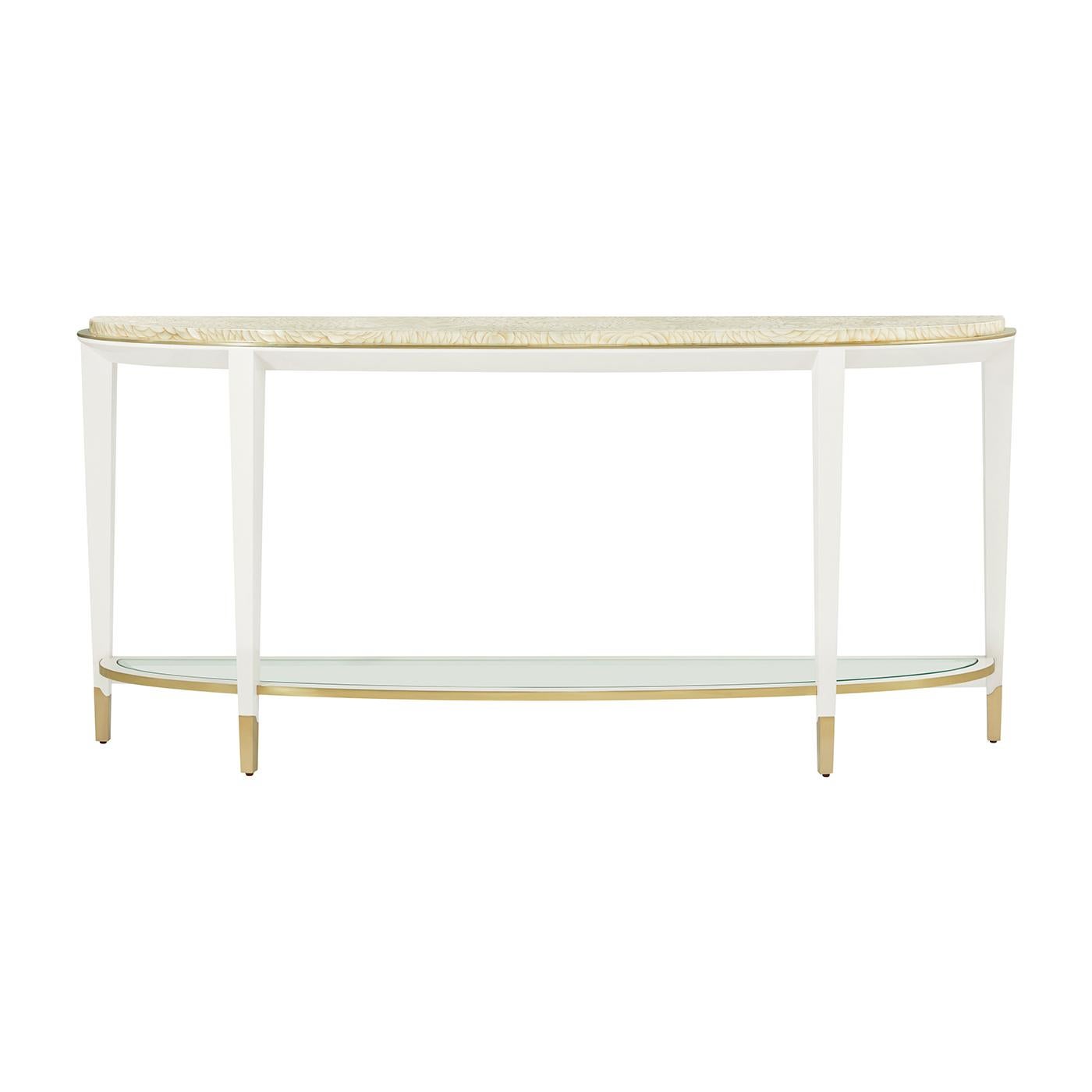 Bring timeless glamour to center stage with its luxurious materials and refined detailing. The hand-painted and polished tabletop features a swirling, feather-like pattern that adds organic elegance and visual depth to its sculptural