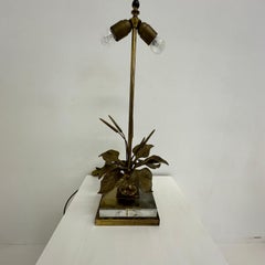 Hollywood regency design table lamp lucite with brass flower , 1970s