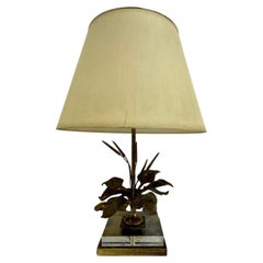 Hollywood regency design table lamp lucite with brass flower , 1970s