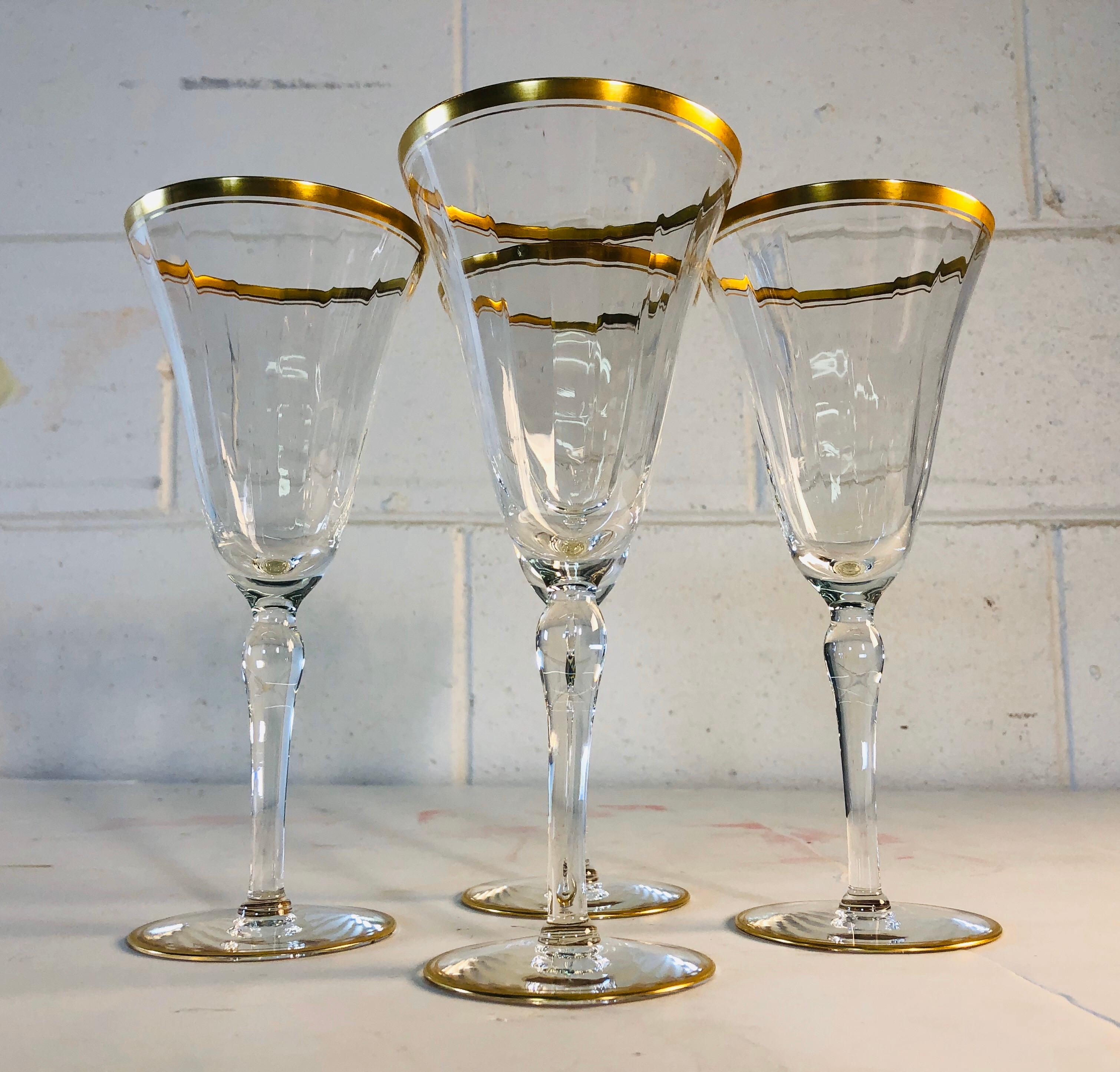 Hollywood Regency style double gold rim tall champagne or wine stems, set of 4. Excellent condition. No marks.
  