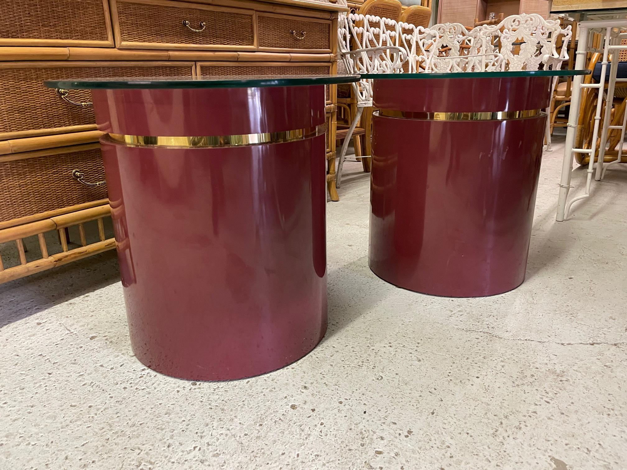 Pair of 1980s drum shaped end table feature brass ring accents and a heavy glass top. Can. be used with glass tops or without. Good condition with minor imperfections consistent with age, see photos for condition details.
For a shipping quote to