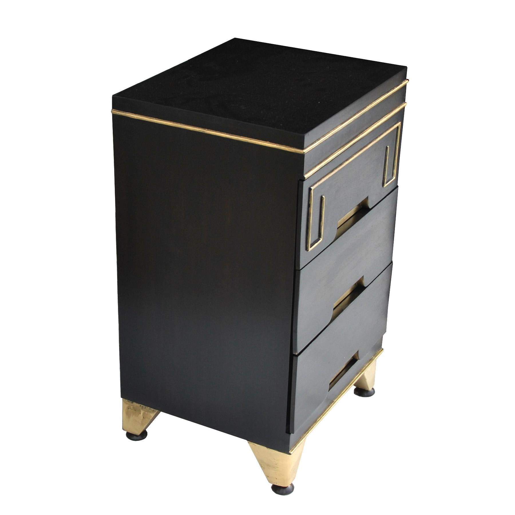 Hollywood Regency dresser

Ebonized 3-drawer nightstand with Greek key details. Recessed pulls and tapered legs accented in gold.

See matching dressers featured:
  