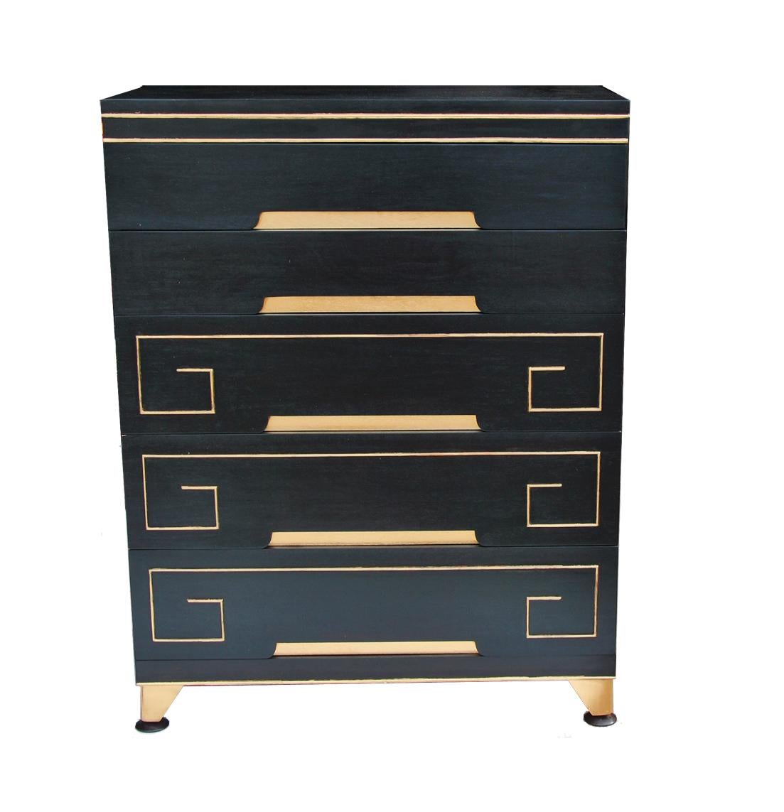 Hollywood Regency Dresser

Tall 5 drawer ebonized dresser with Greek key details. Recessed pulls and tapered legs accented in gold.

Restored.
 

 
