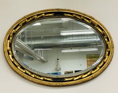Hollywood Regency Ebony and Gilt Wall, Console or Mantle Mirror