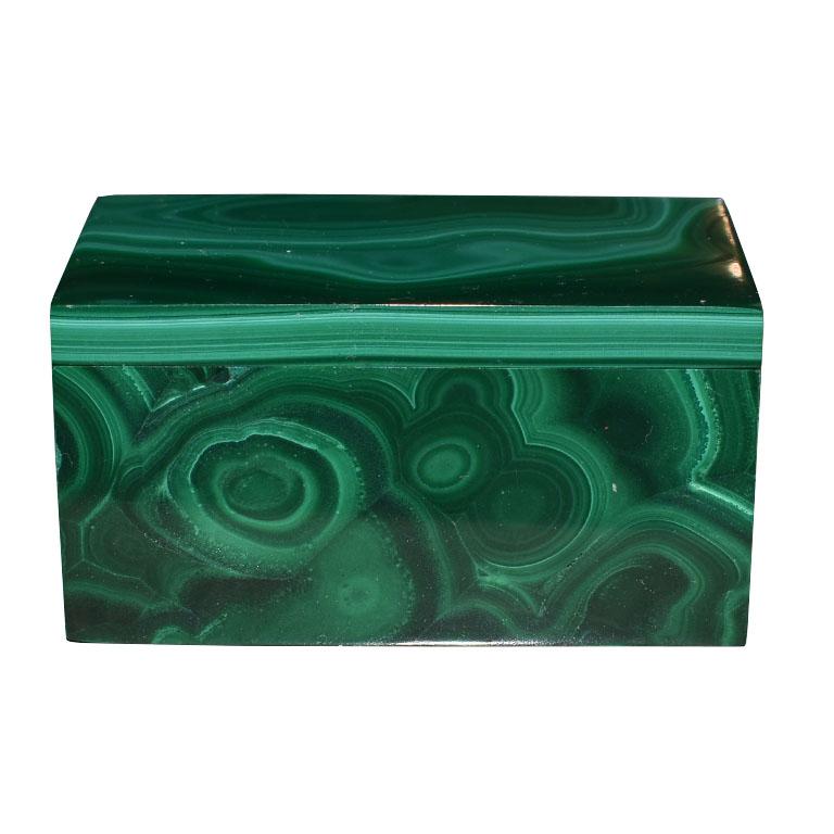 A beautiful polished green malachite decorative box with a lid. Brought from a trip to Egypt in the 1970s, this piece will be fabulous on a nightstand or coffee table. 

Dimensions:
2.25