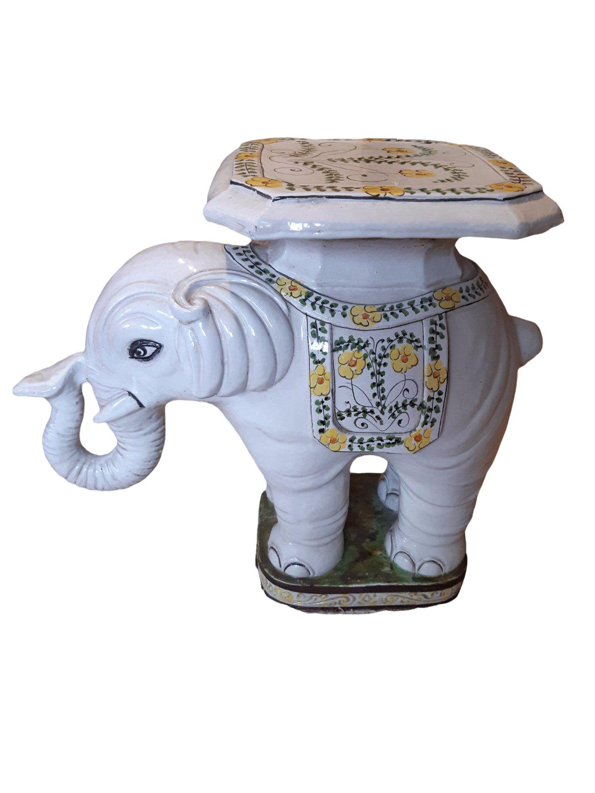 Early-20th century glazed ceramic elephant garden stool, flower pot seat or side table. Handmade of ceramic. Nice addition to your home, patio or garden. A nice addition to any room, patio or yard. Also nice at your pool area as a drinks stand