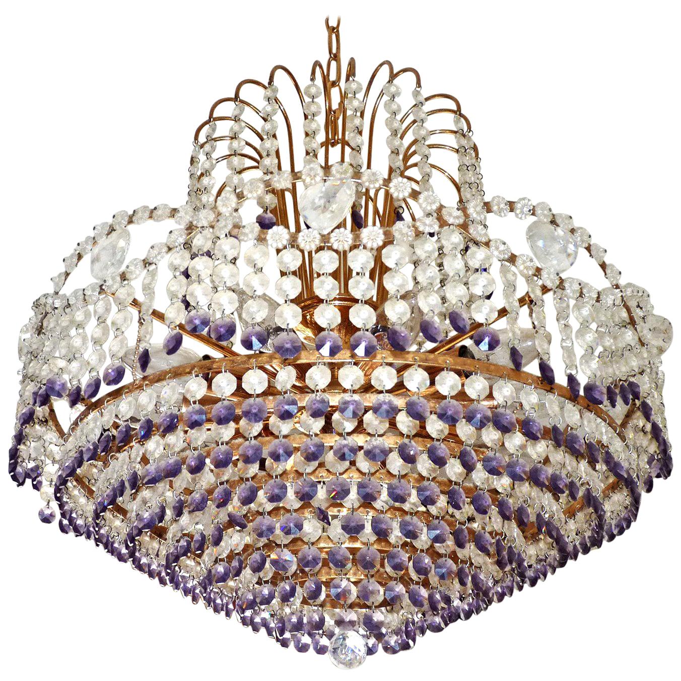 Stunning French Hollywood Regency Empire amethyst cut crystal and gilt brass 10-light chandelier with crystal drops and swags
Measures:
Diameter 21.3 in/ 54 cm
Height 37.8 in / 96 cm
Weight 18 lb/8 Kg
Ten light bulbs E14/ good working