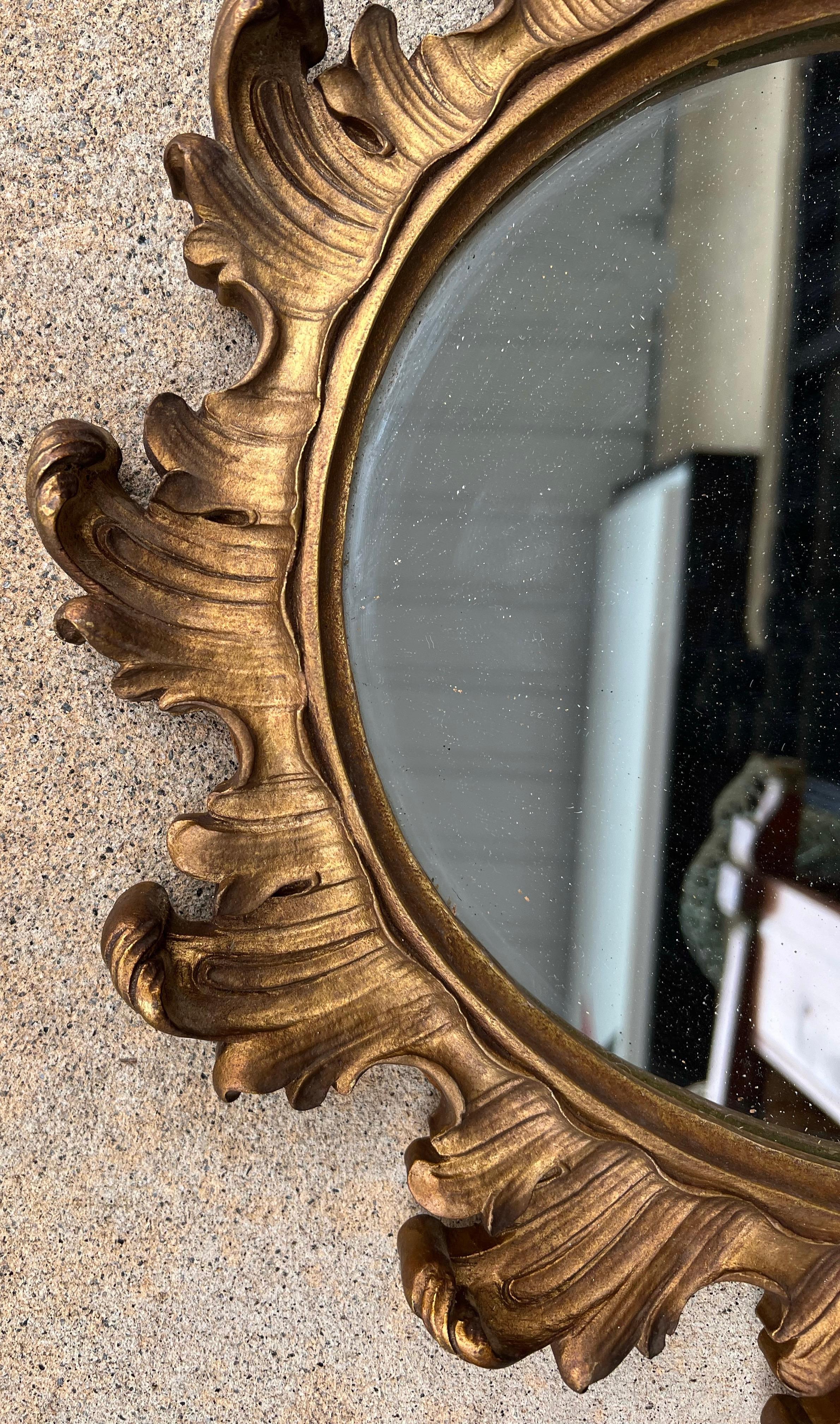 Hollywood Regency Era Carved Giltwood Scalloped Edge Mirrors, Pair In Good Condition For Sale In Kennesaw, GA