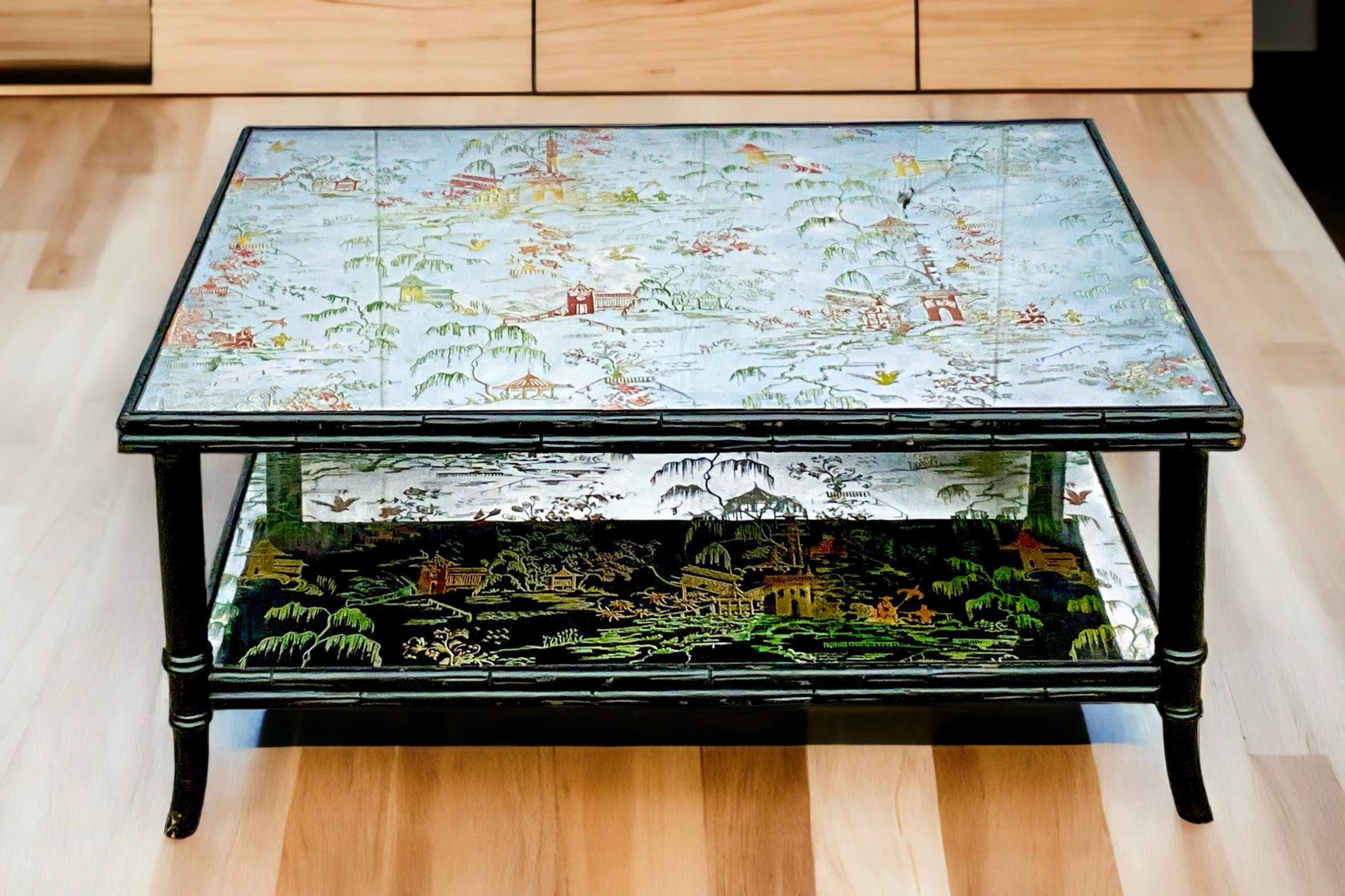 This is a faux bamboo two tiered coffee table with two tiered églomisé chinoiserie scenes on mirrored glass. A rare bird! The frame is a black lacquer carved wood. It is a midcentury piece and most likely Italian. Please note the lines are