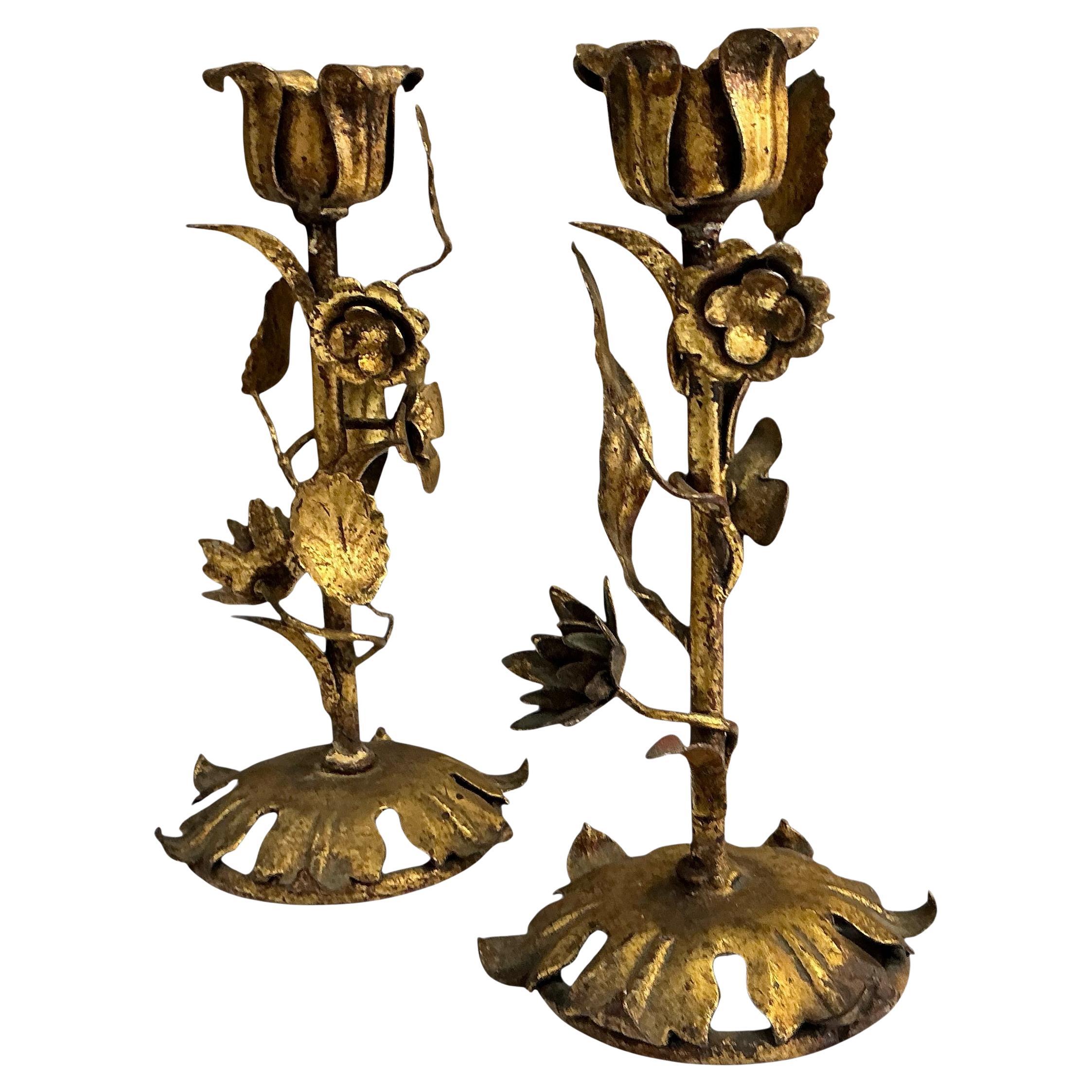 This is a nice pair of Hollywood Regency Era Italian gilt metal floral candlesticks. They are unmarked and in very good condition. 