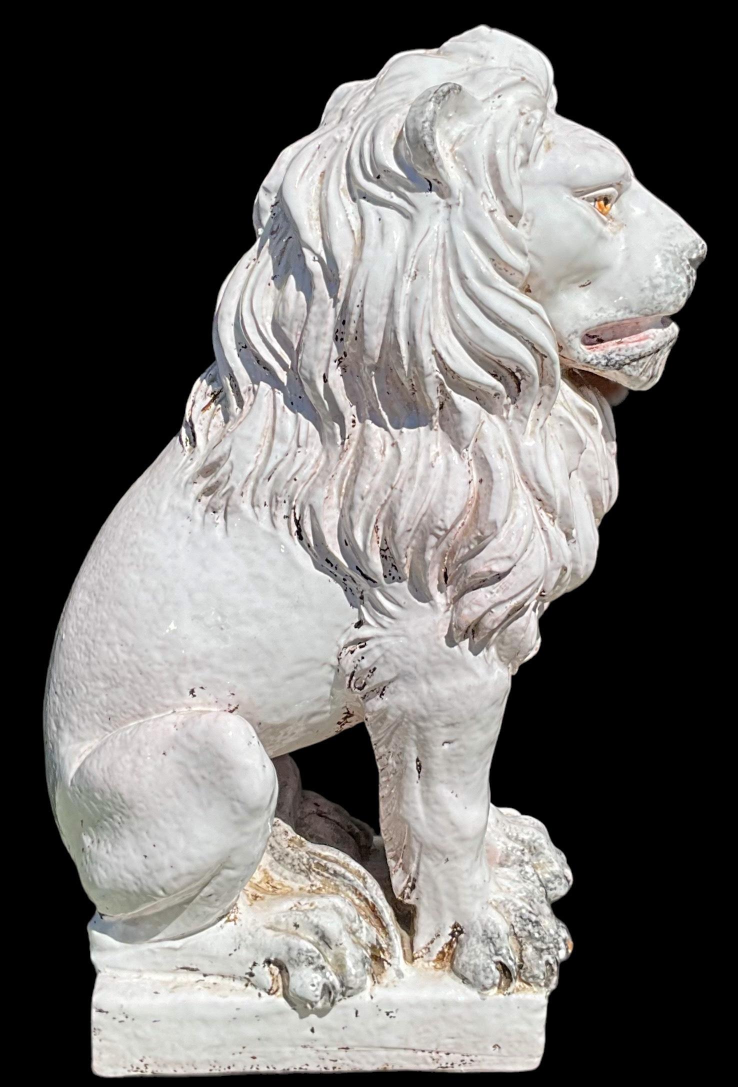 This is a handsome Hollywood Regency Era Italian white lion terracotta figurine. He is signed and numbered. It is in very good condition.