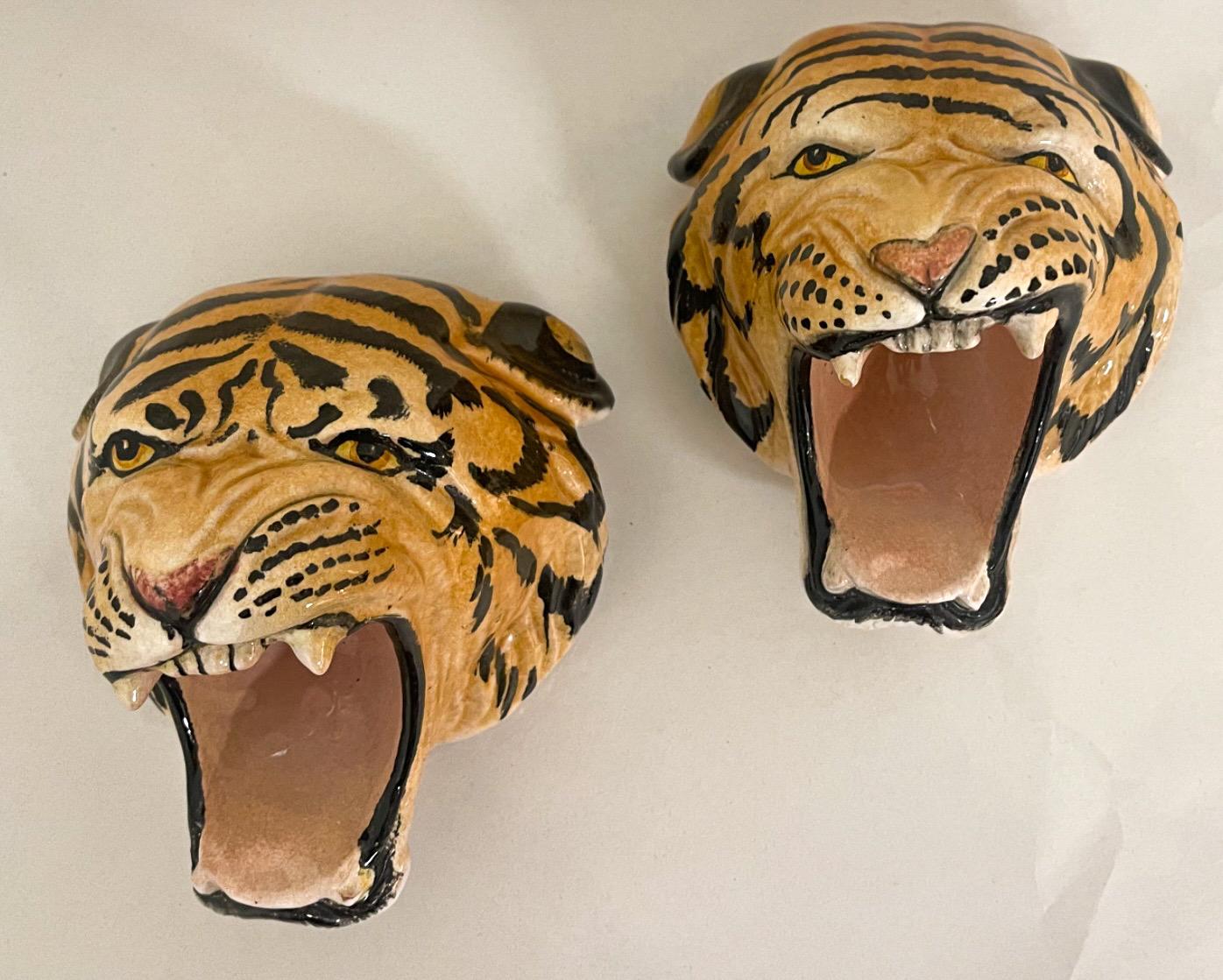 Gifting is upon us! This is a pair of Hollywood Regency Italian terracotta Tiger figurines in very good condition!.