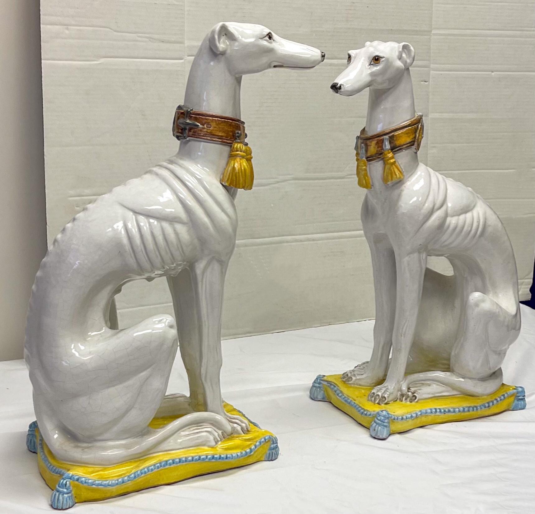 This is a Hollywood Regency Era pair of signed Italian whippets, possibly intended to be male and female. They are signed and in very good condition.