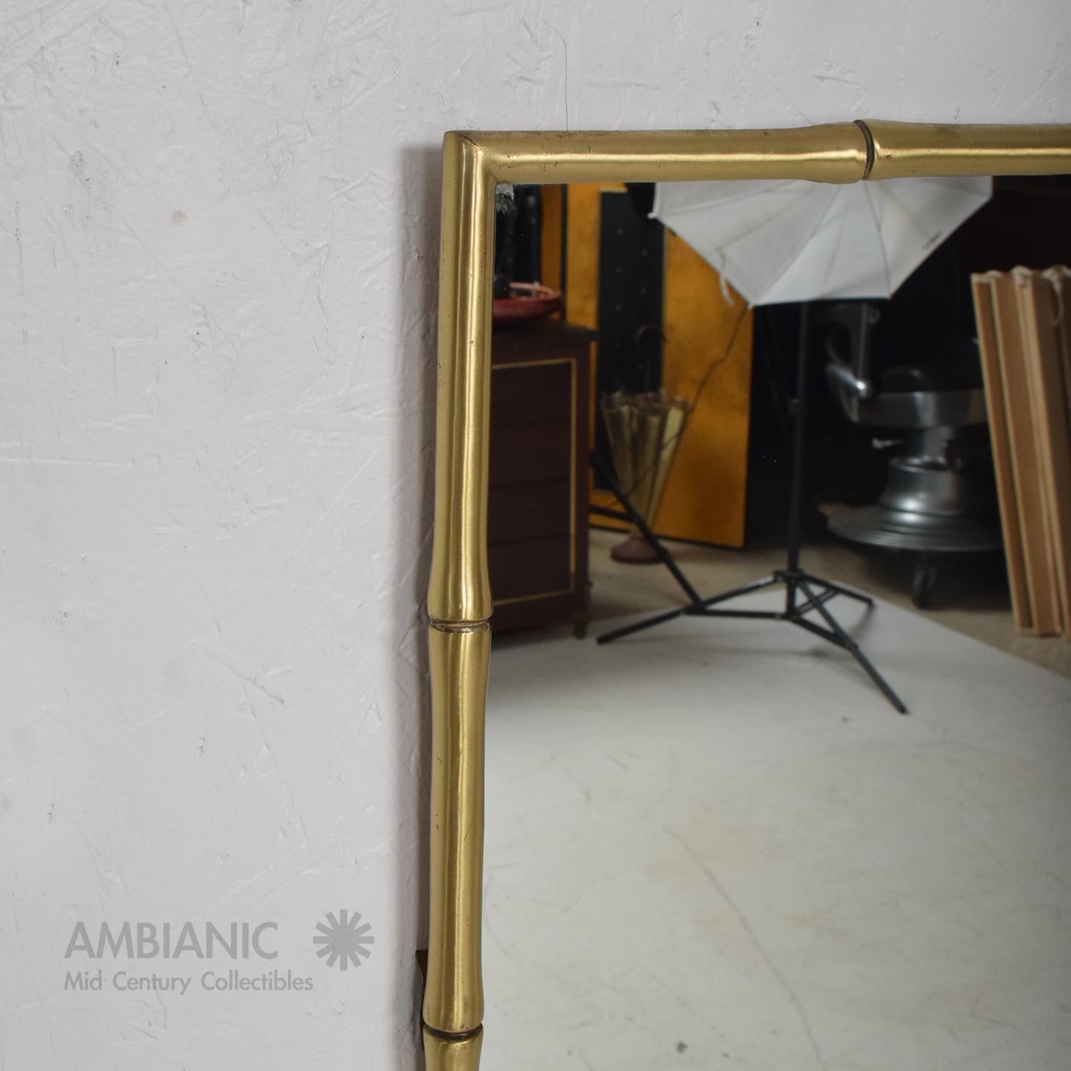 Mid-20th Century Regency Moderne Wall Mirror in Faux Bamboo Solid Brass Style James Mont 1960s
