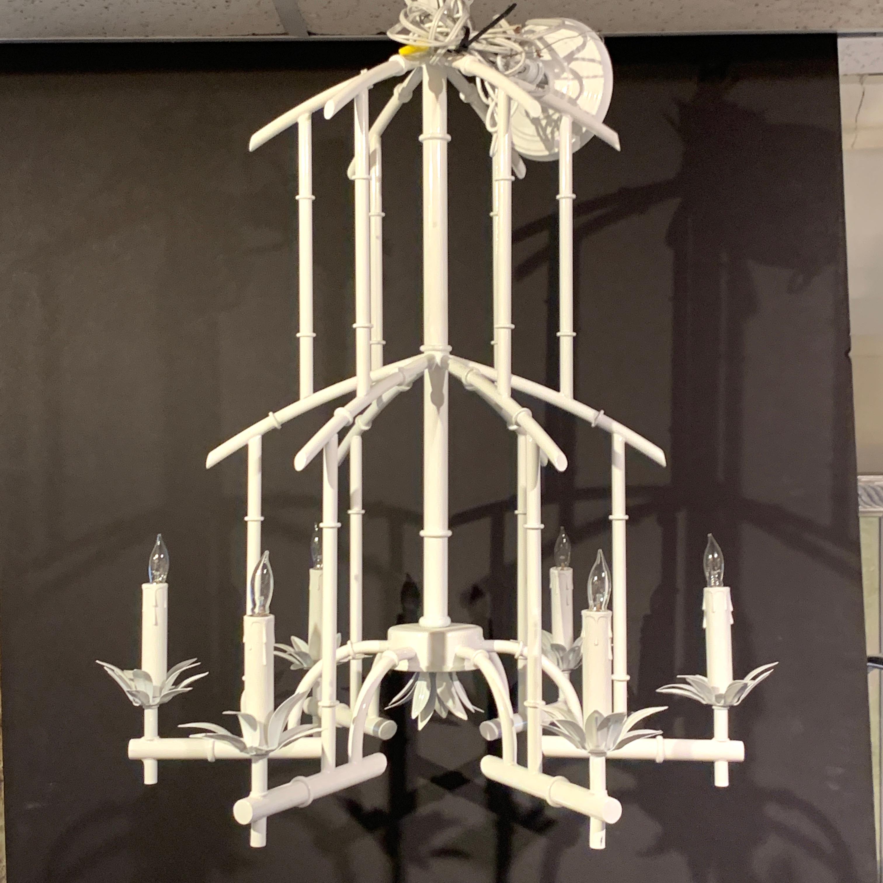 Hollywood Regency faux bamboo six light pagoda chandelier, in white.