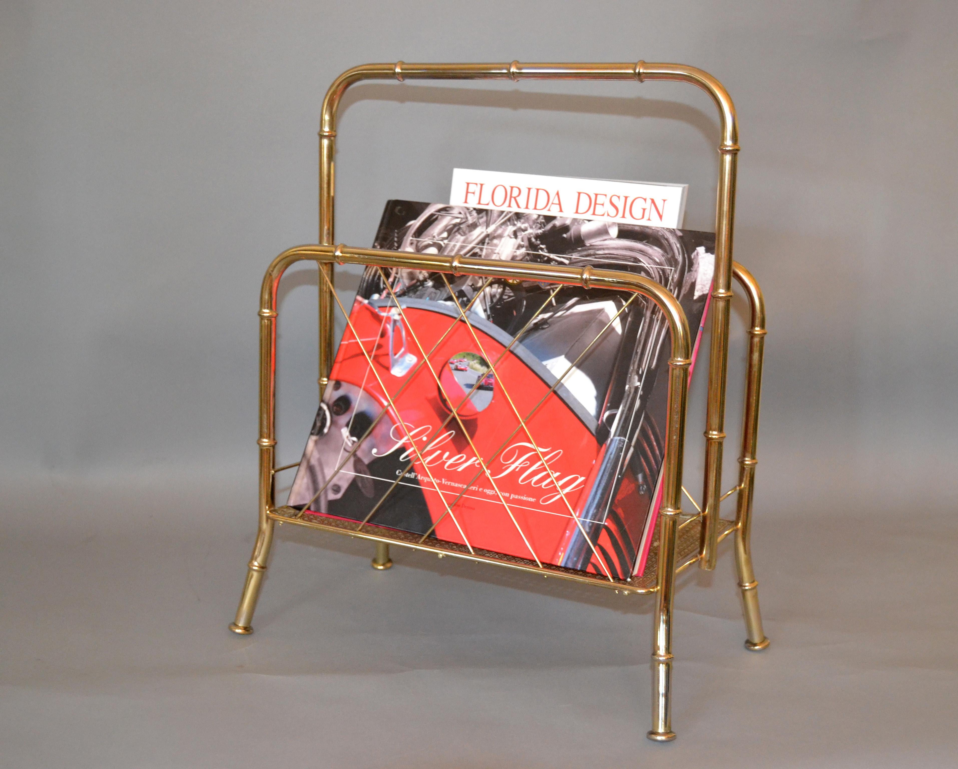 Hollywood Regency faux brass bamboo and cane magazine rack.
The magazine and book is just for decoration.
Simply lovely.