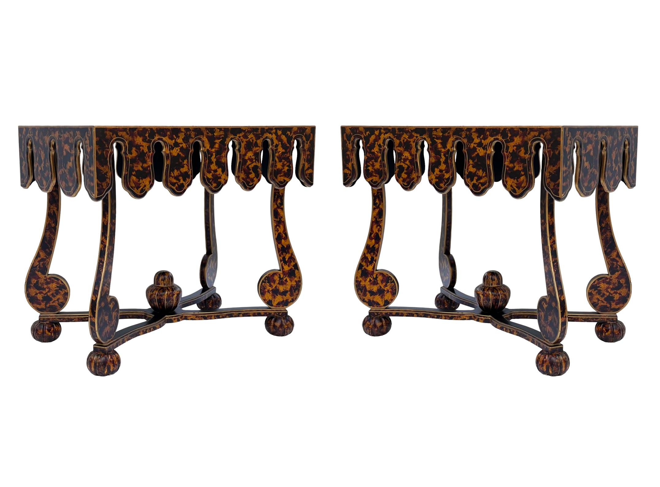 A designer pair of end tables in faux tortoise shell. These are made of wood construction. Nice clean condition. 