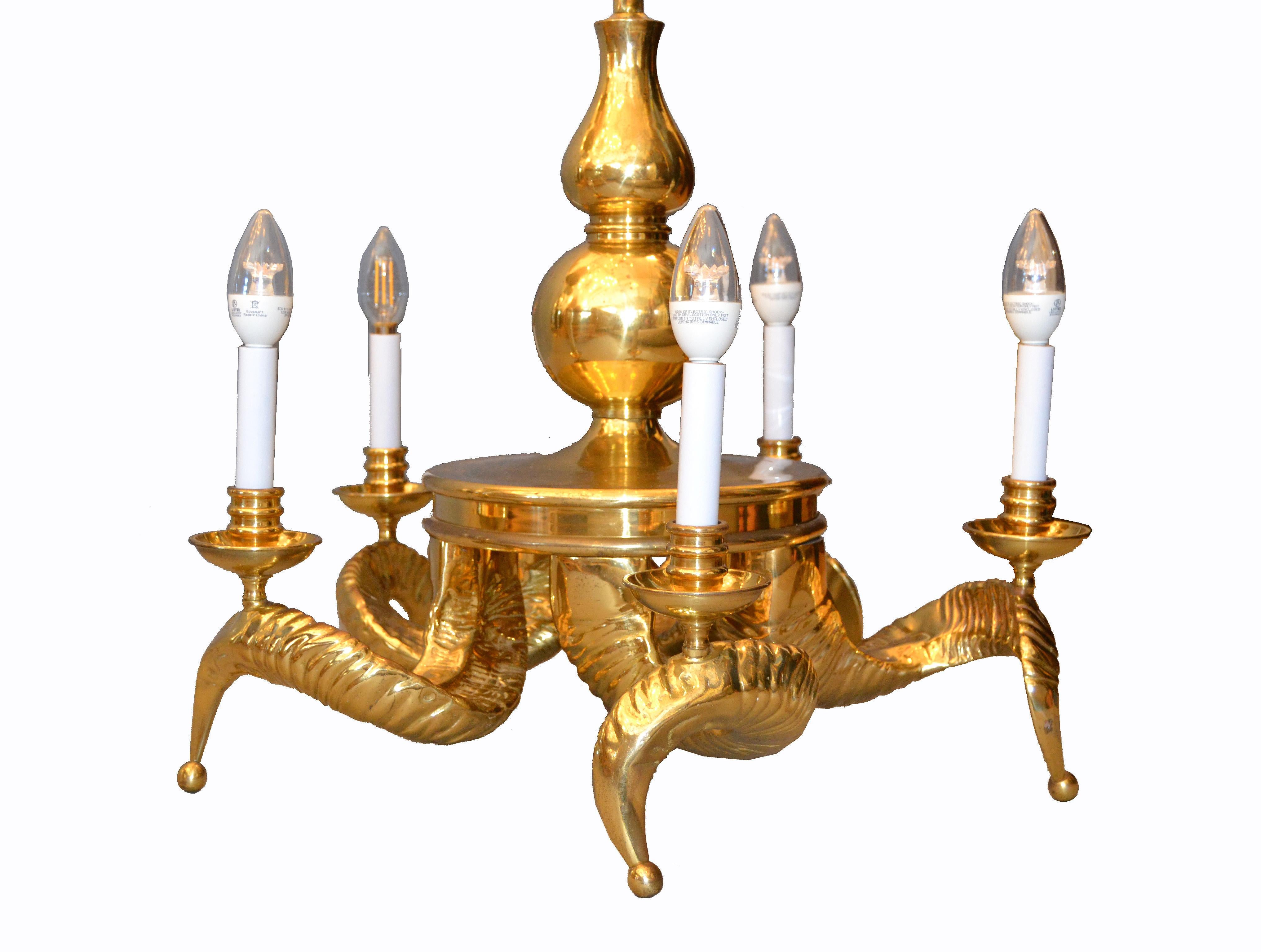 Hollywood Regency massive beautiful five-light bronze ram horns chandelier with exceptional detail from top to bottom.
This heavy bronze chandelier is in very good condition and shows age related patina.
It has been professionally rewired and