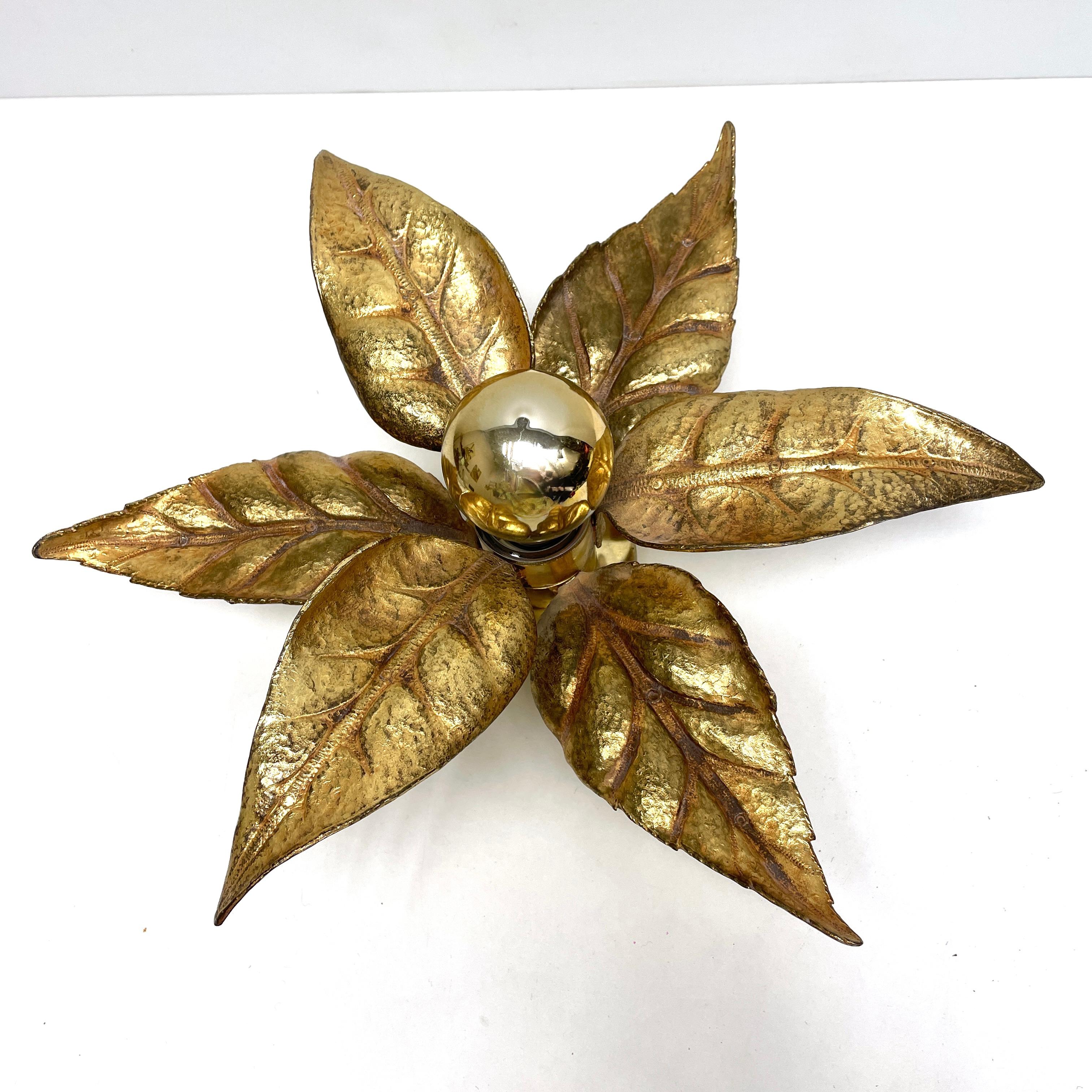 Elegant Willy Daro flower light for ‘Massive Lighting', 1970s. Cast brass flower wall or ceiling light, the light attaches by a plate so can be used either way. The light is wired and in full working order, but as with all our lighting we would