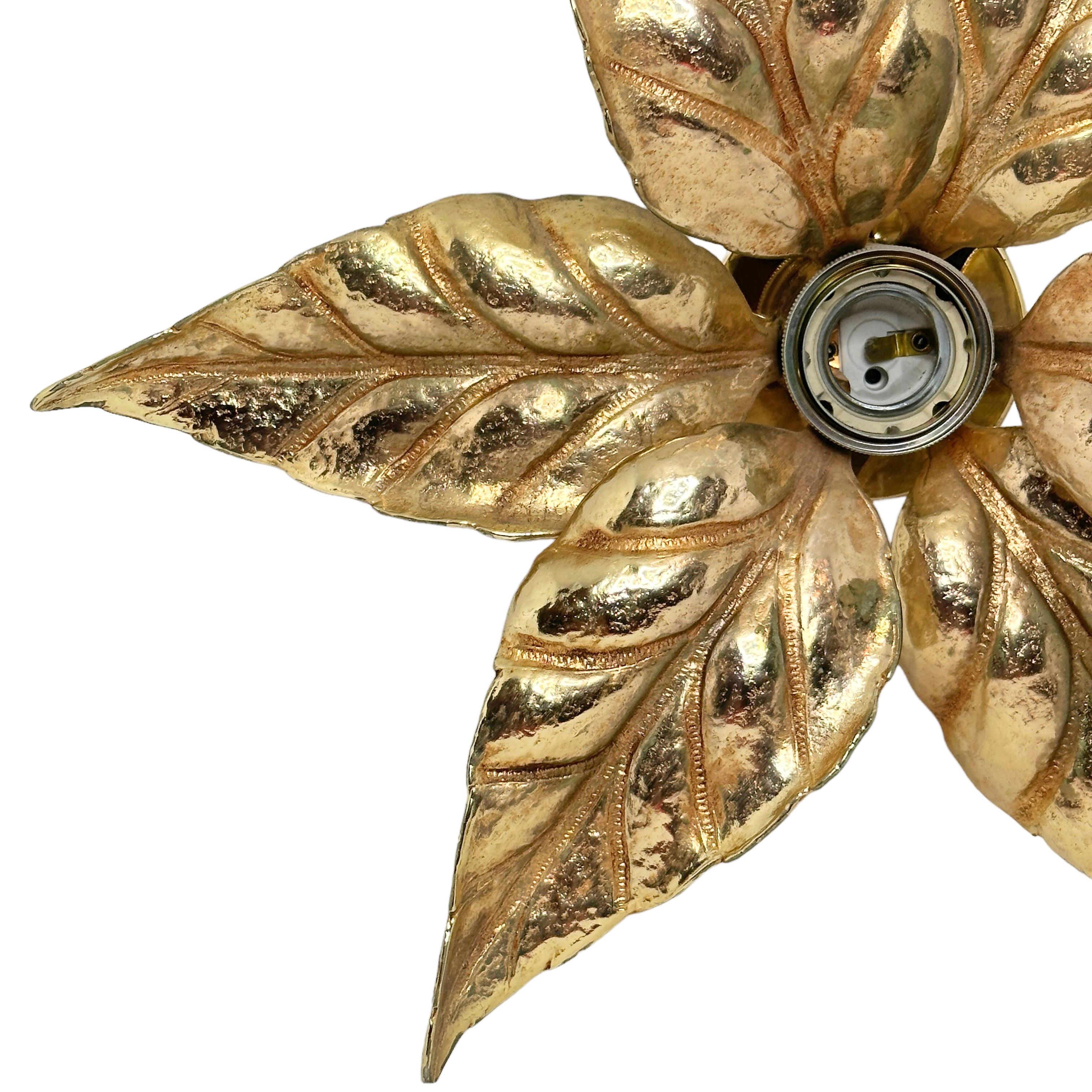 Elegant Willy Daro flower light for ‘Massive Lighting', 1970s. Cast brass flower wall or ceiling light, the light attaches by a plate so can be used either way. The light is wired and in full working order, but as with all our lighting we would