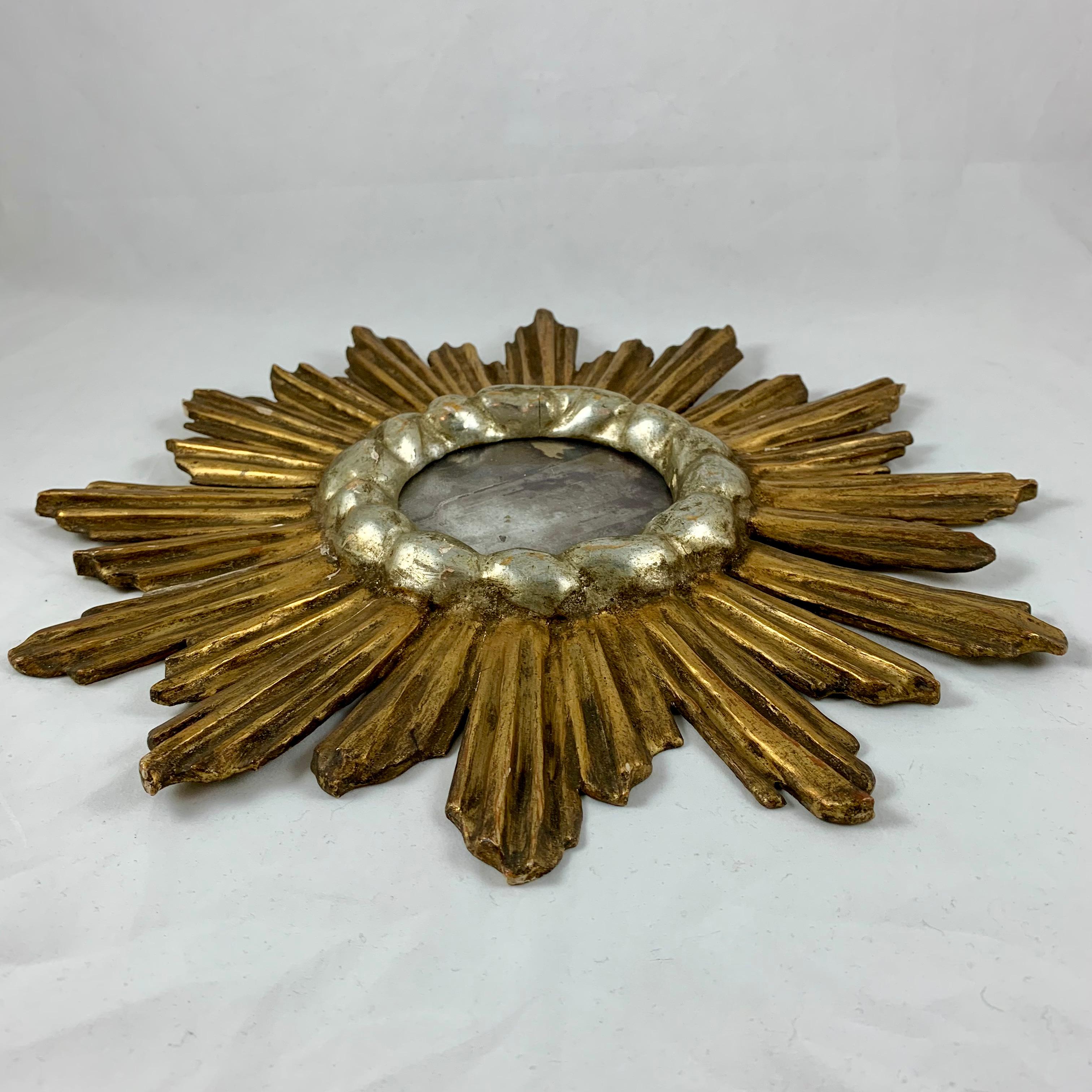 Hollywood Regency French Giltwood and Gesso Sunburst and Cloud Bezel Wall Mirror In Good Condition In Philadelphia, PA