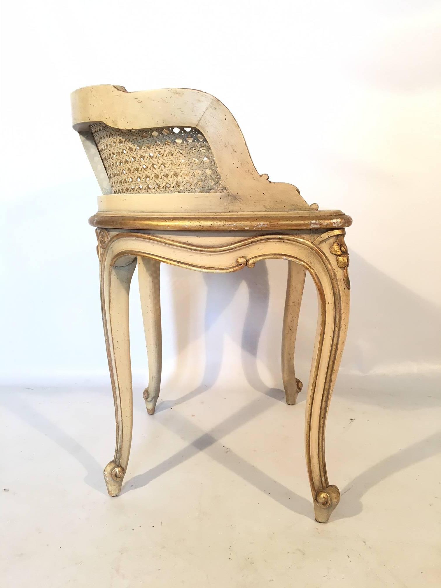 French Provincial style cane seat vanity stool perfect for your Hollywood Regency décor, circa 1960s. Excellent vintage condition.