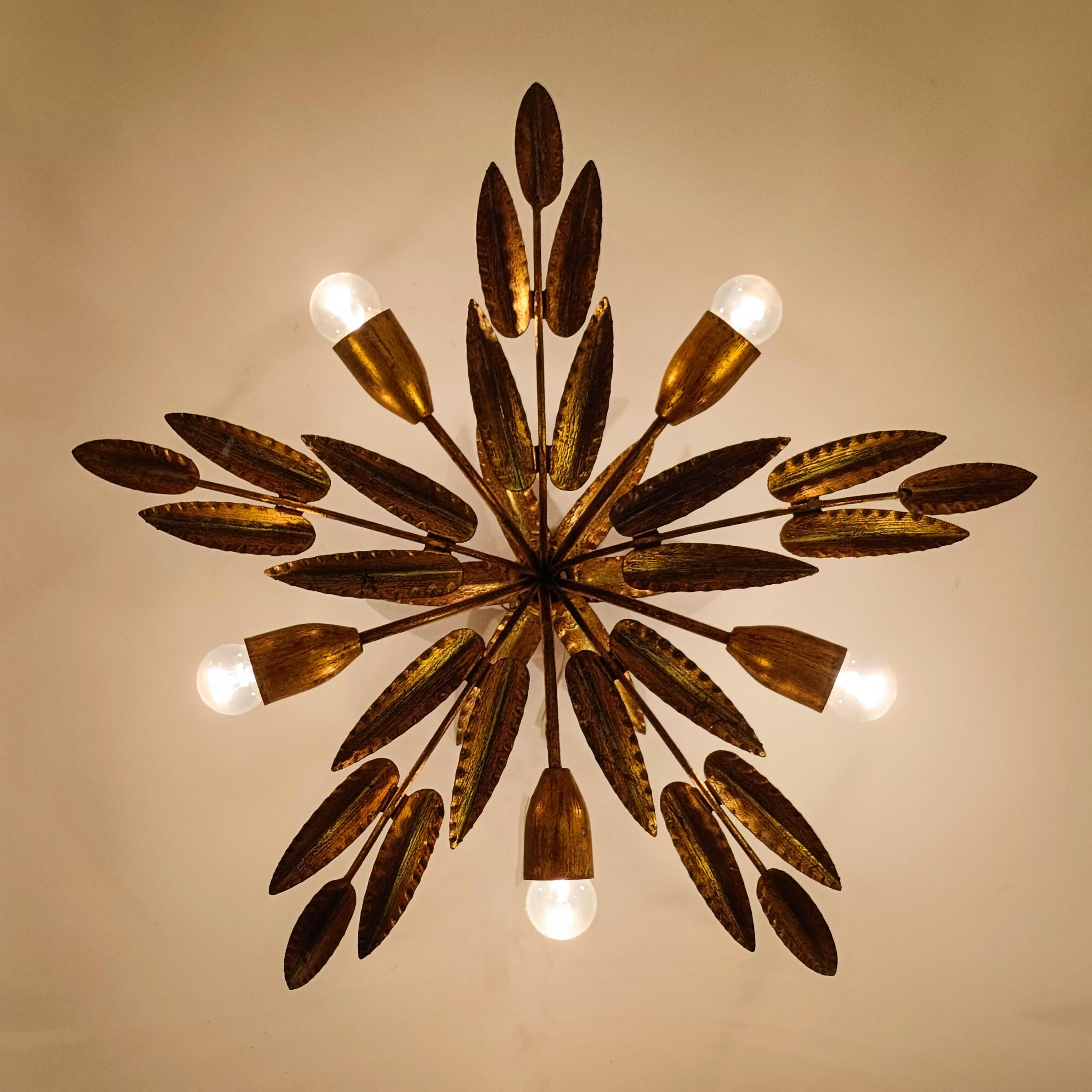 Iron Hollywood Regency. Gilded leaves flush mount by Ferro Art, Spain, 1950s For Sale