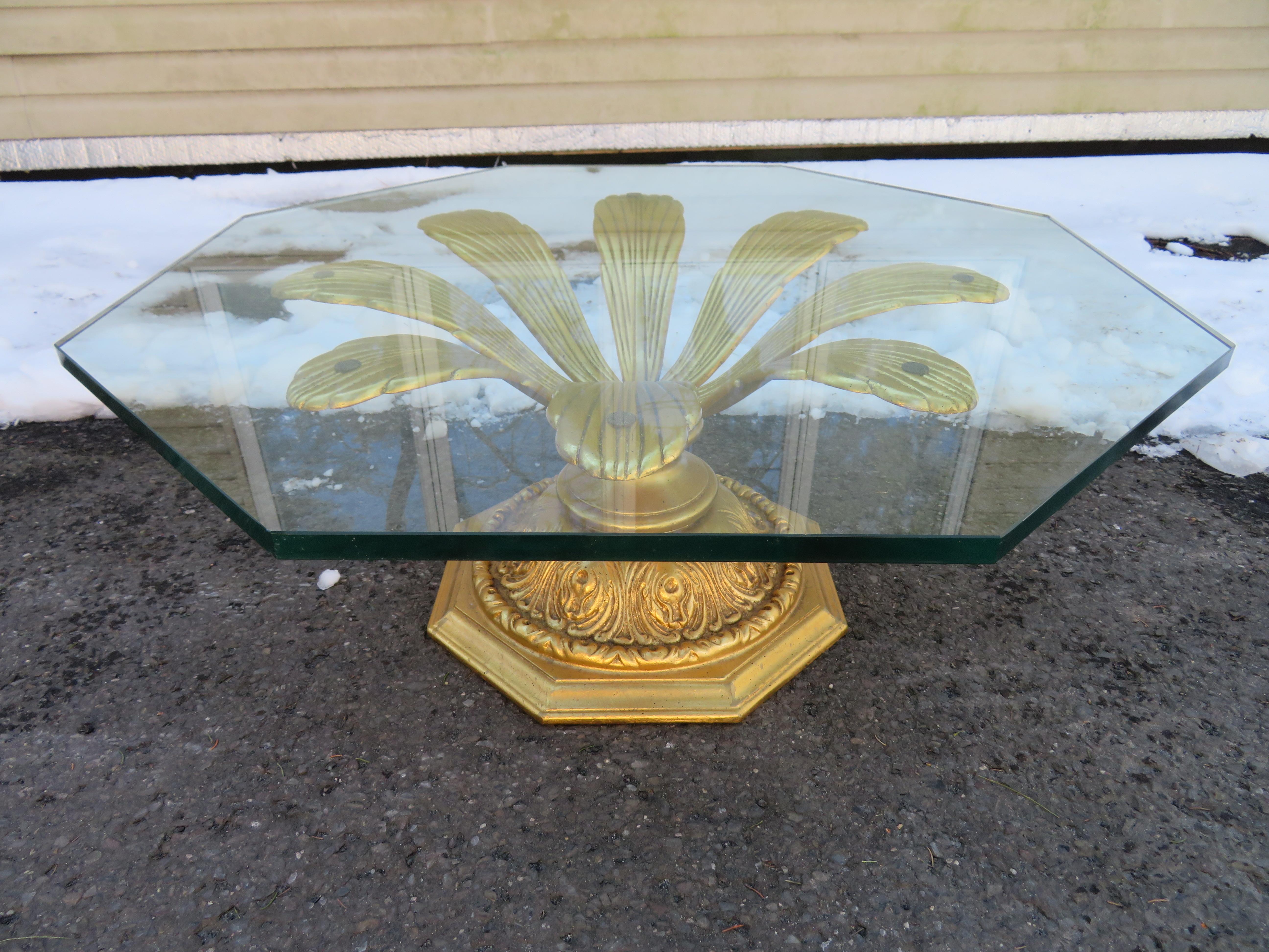 Spectacular vintage Hollywood Regency coffee table in the style of Arthur Court. Heavy, metal base gilded with gold and black fleck color paint. Elegant blossoming form. Outstanding craftsmanship with steadfast welds. A functional work of art sure