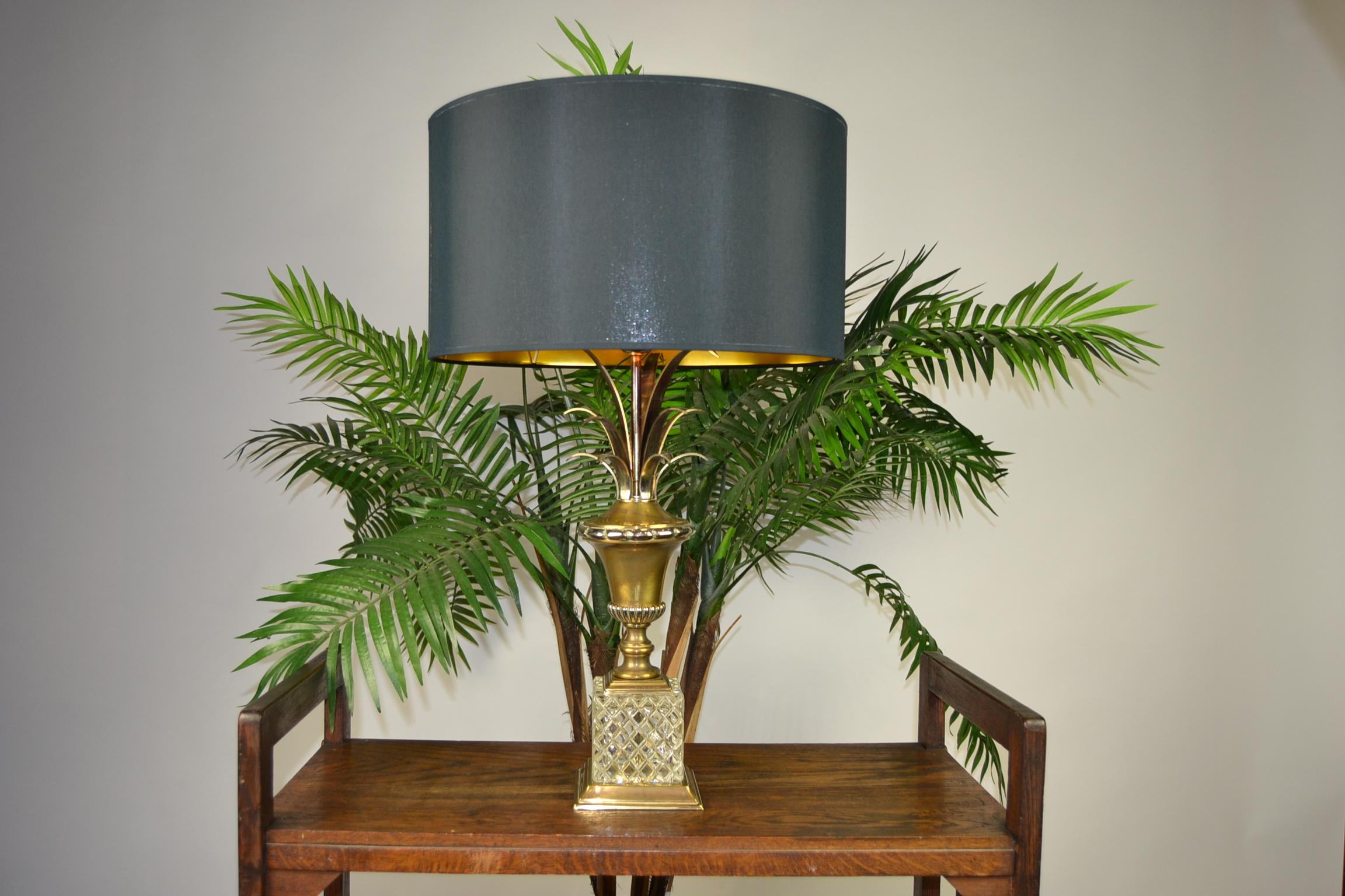 Stylish Hollywood Regency Pineapple Leaf Table Lamp. 
This French Table Light has a gold-plated / gilt brass base with Crystal Glass. 
Is made in the style of Maison Charles - Maison Jansen - Boulanger and dates from the 1970s. Is in beautiful