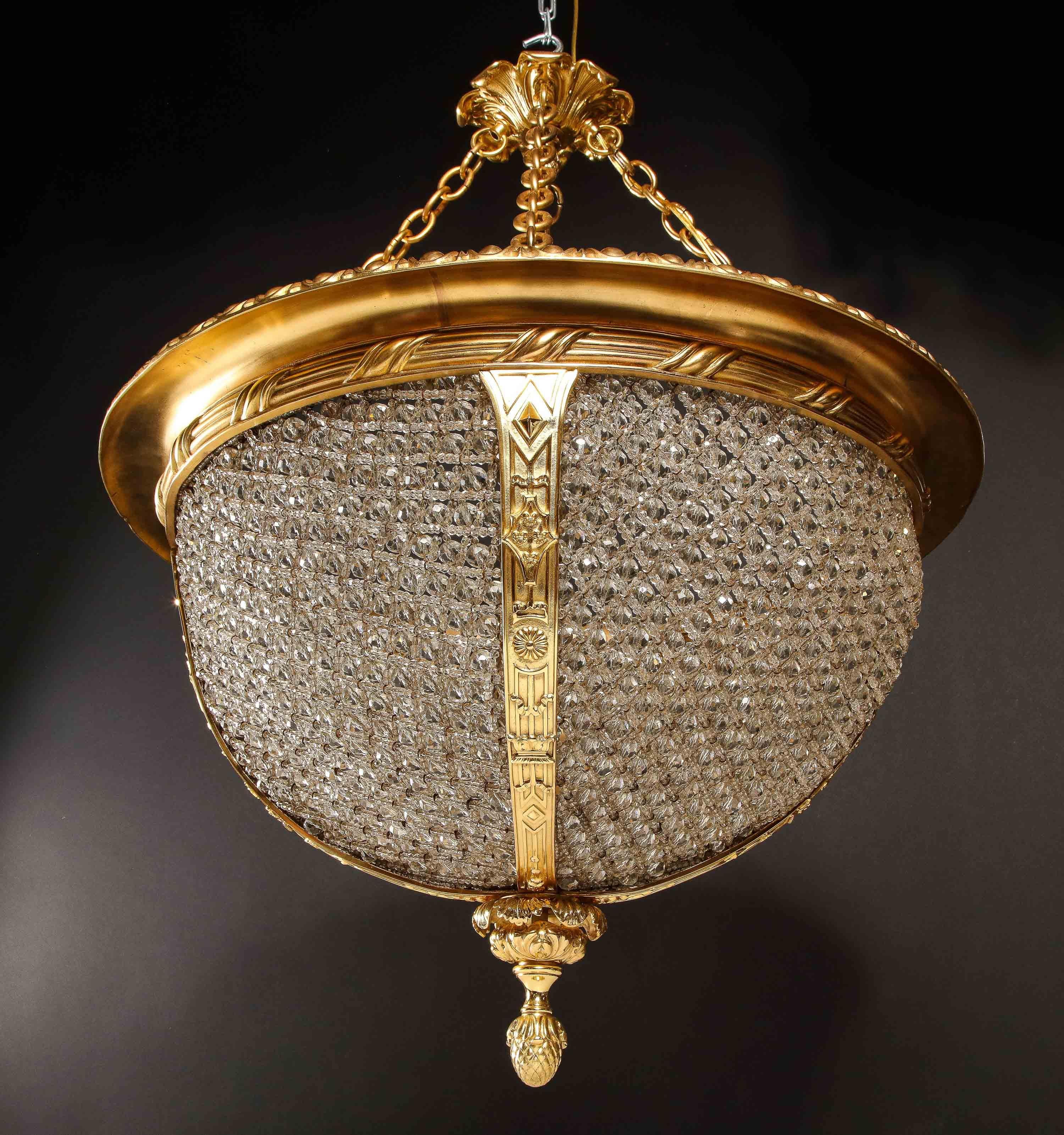 French Hollywood Regency Gilt Bronze and beaded glass Circular Chandelier For Sale
