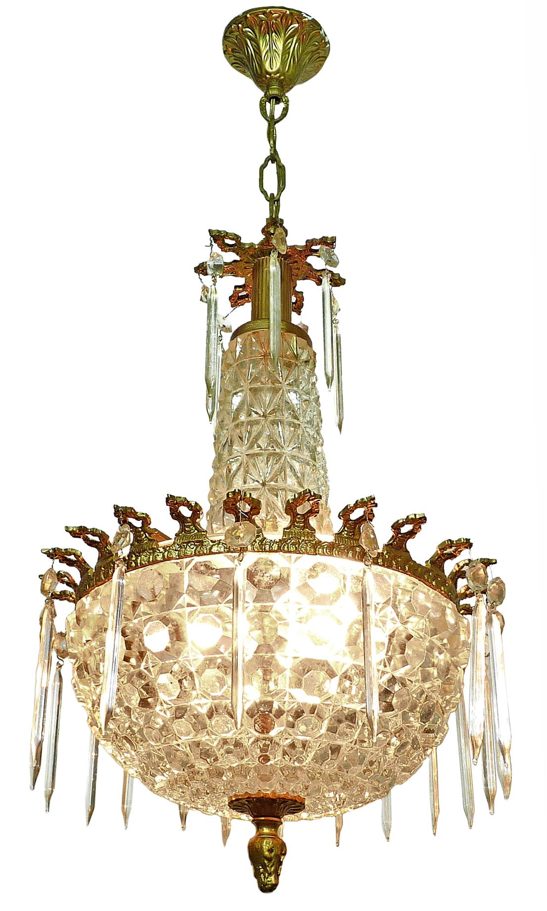 Beautiful 1950s antique French Art Deco gilt bronze and thick glass 2-light crystal teardrop chandelier
Measures:
Diameter 11.8 in / 30 cm
Height 27.55 in (5 in/chain); 70 cm (12 cm/chain)
Weight 15 lb. (7 kg).
2 light bulbs E14
Good working