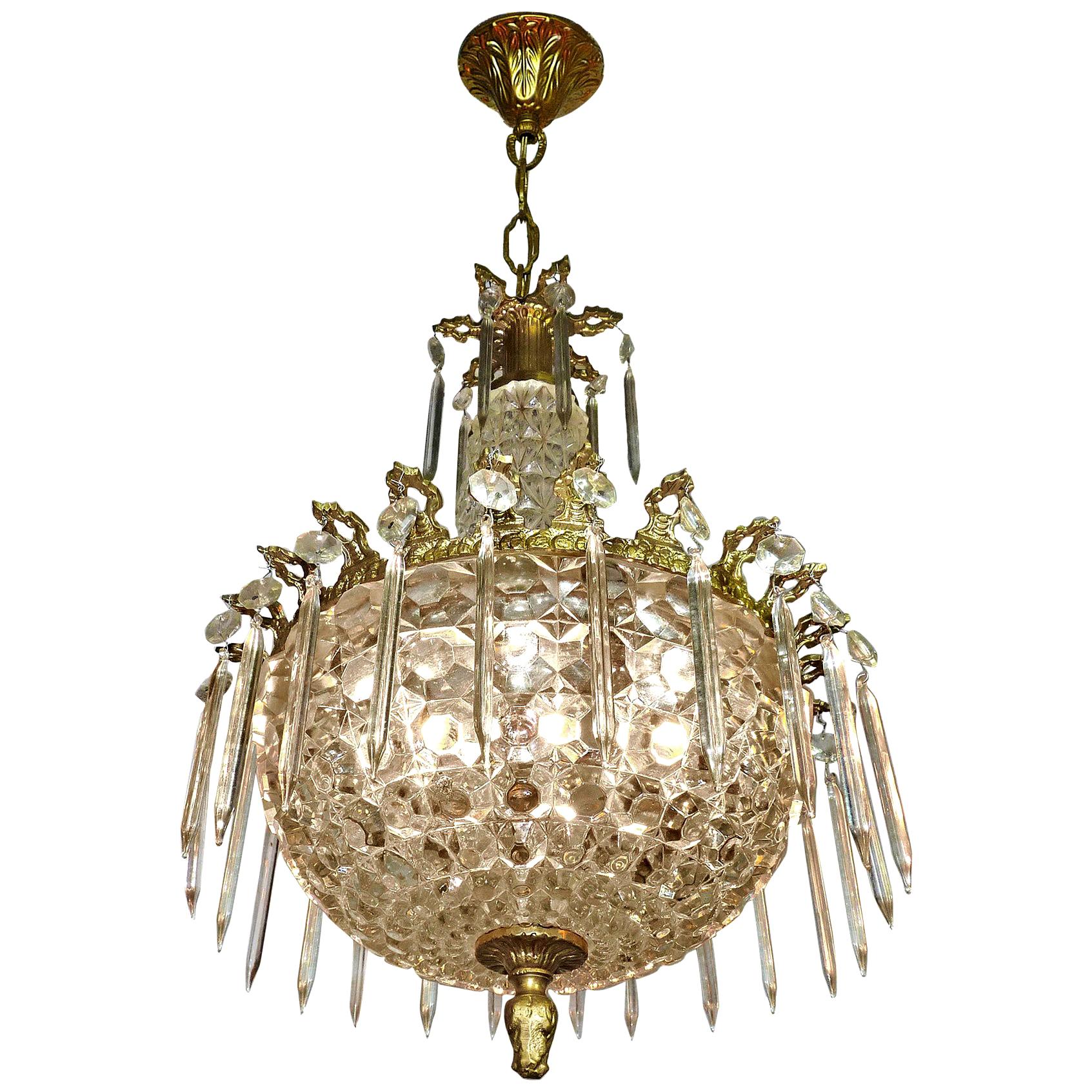 Beautiful 1950s antique French Art Deco gilt bronze and thick glass 2-light crystal teardrop chandelier
Measures:
Diameter 11.8 in / 30 cm
Height 27.55 in (5 in/chain); 70 cm (12 cm/chain)
Weight 15 lb. (7 kg).
2 light bulbs E14
Good working