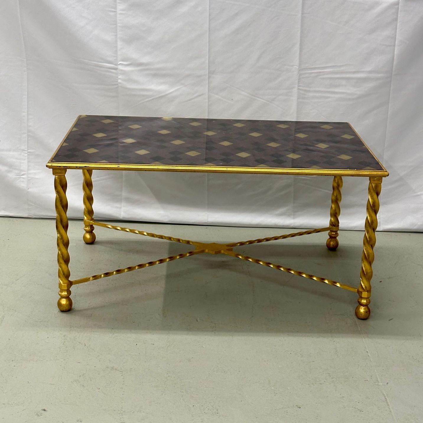 Hollywood Regency gilt metal carved leg rectangular coffee / cocktail table
A fine custom glass table top with reverse painted diamond design on a twist Bagues style table base of gilt metal. 
Measures: 18H x 37W x 23.75D.