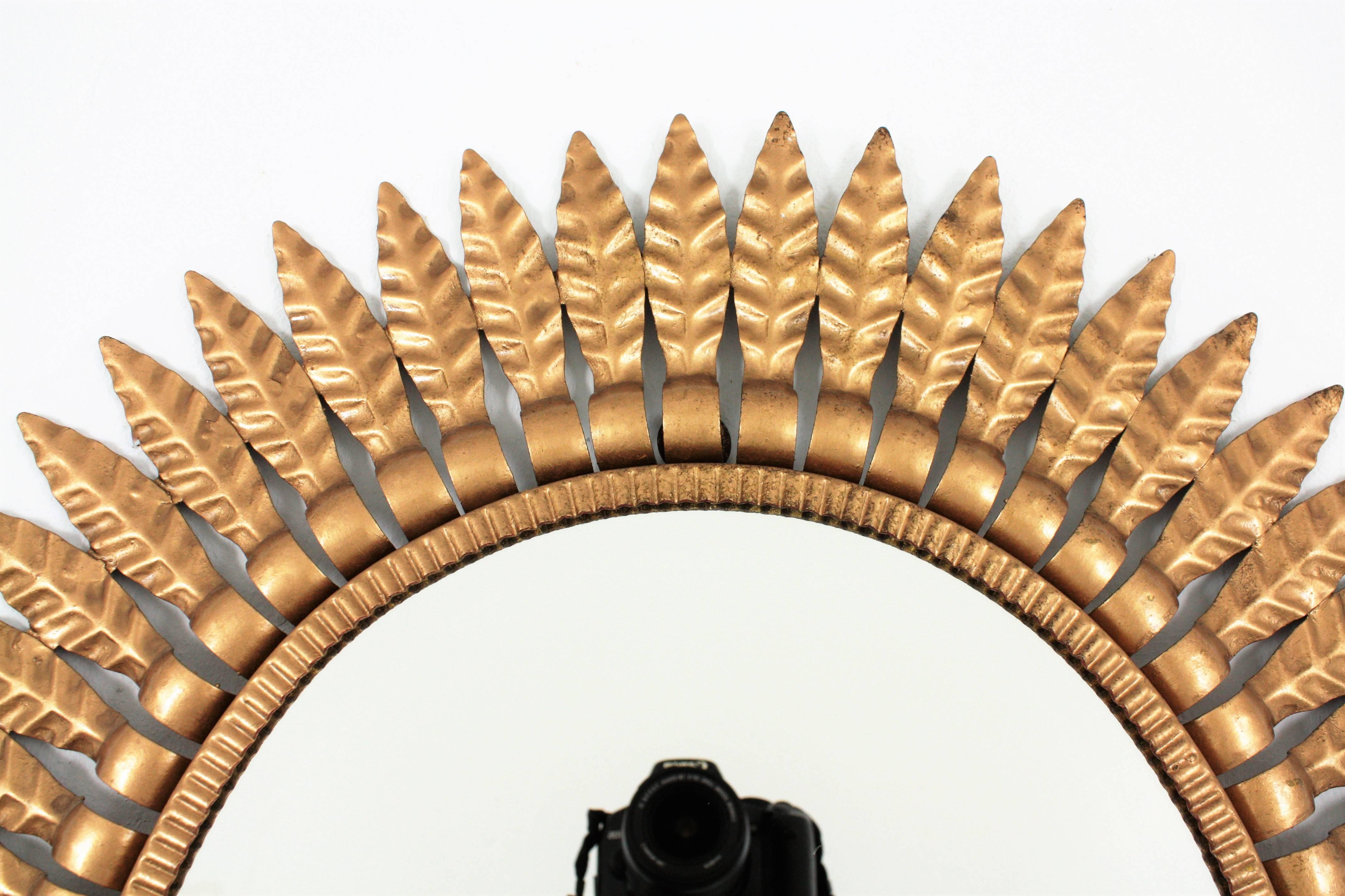 Hollywood Regency Gilt Metal Oval Sunburst Mirror, Spain, 1950s 1