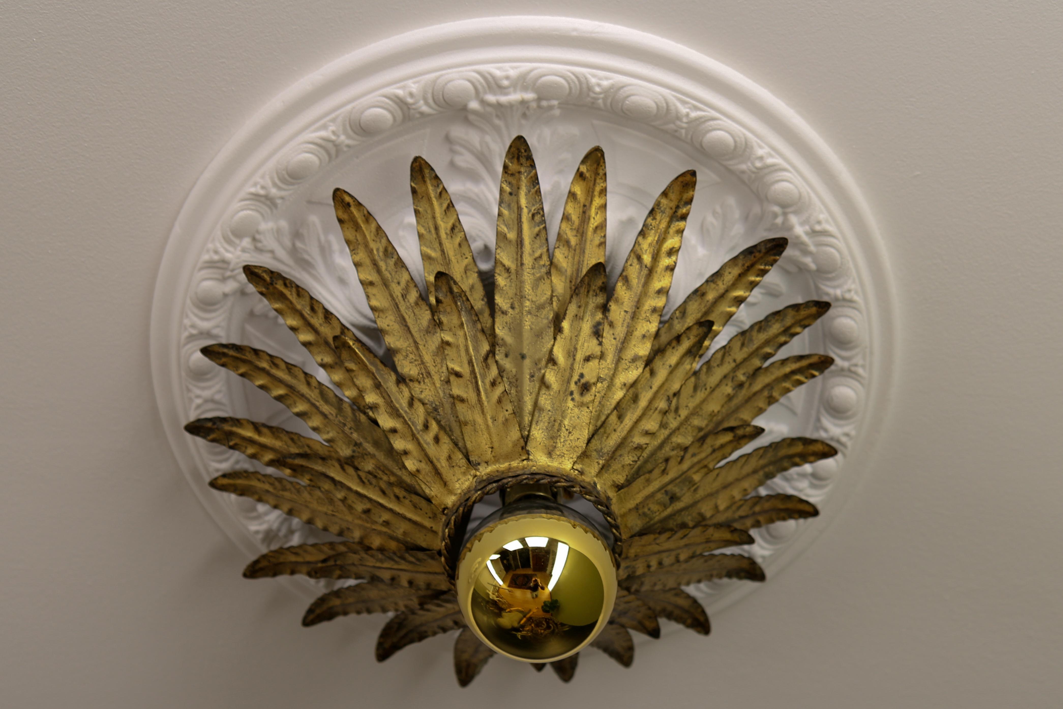 Spanish Hollywood Regency Gilt Metal Sunburst-Shaped Crown Ceiling Light Fixture, 1960s For Sale