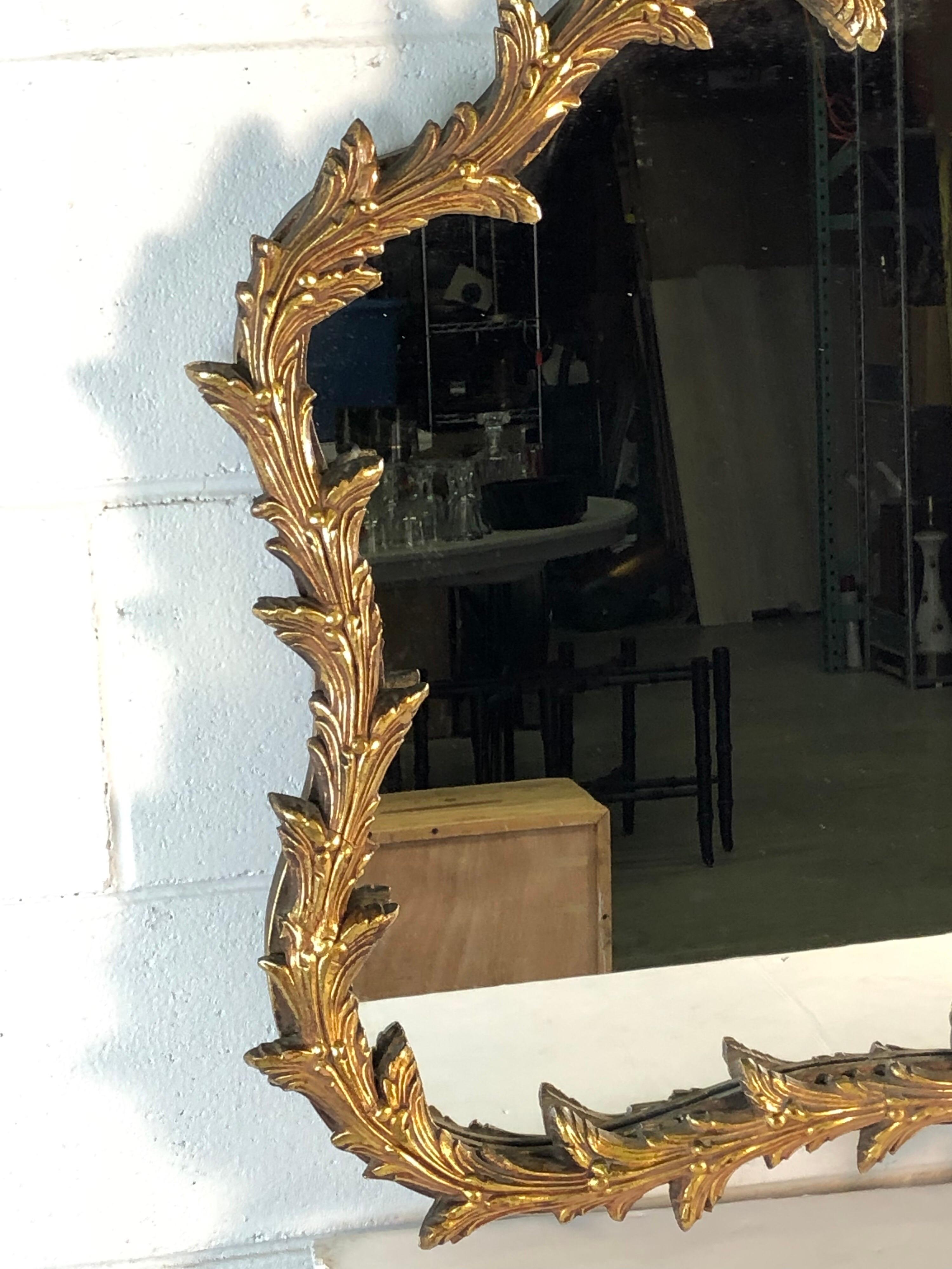 20th Century Hollywood Regency Giltwood Bow and Leaf Wall Mirror For Sale