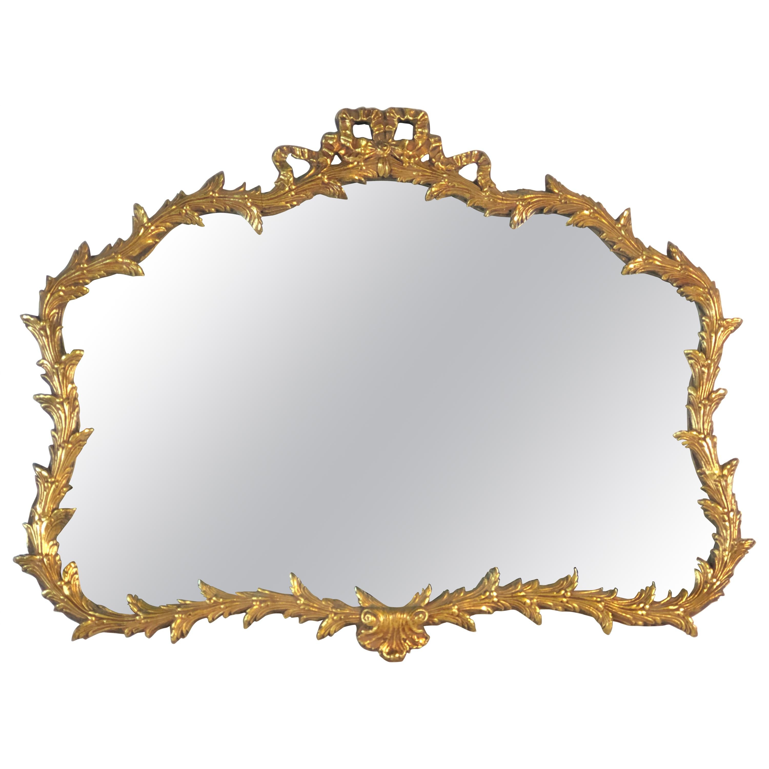 Hollywood Regency Giltwood Bow and Leaf Wall Mirror For Sale