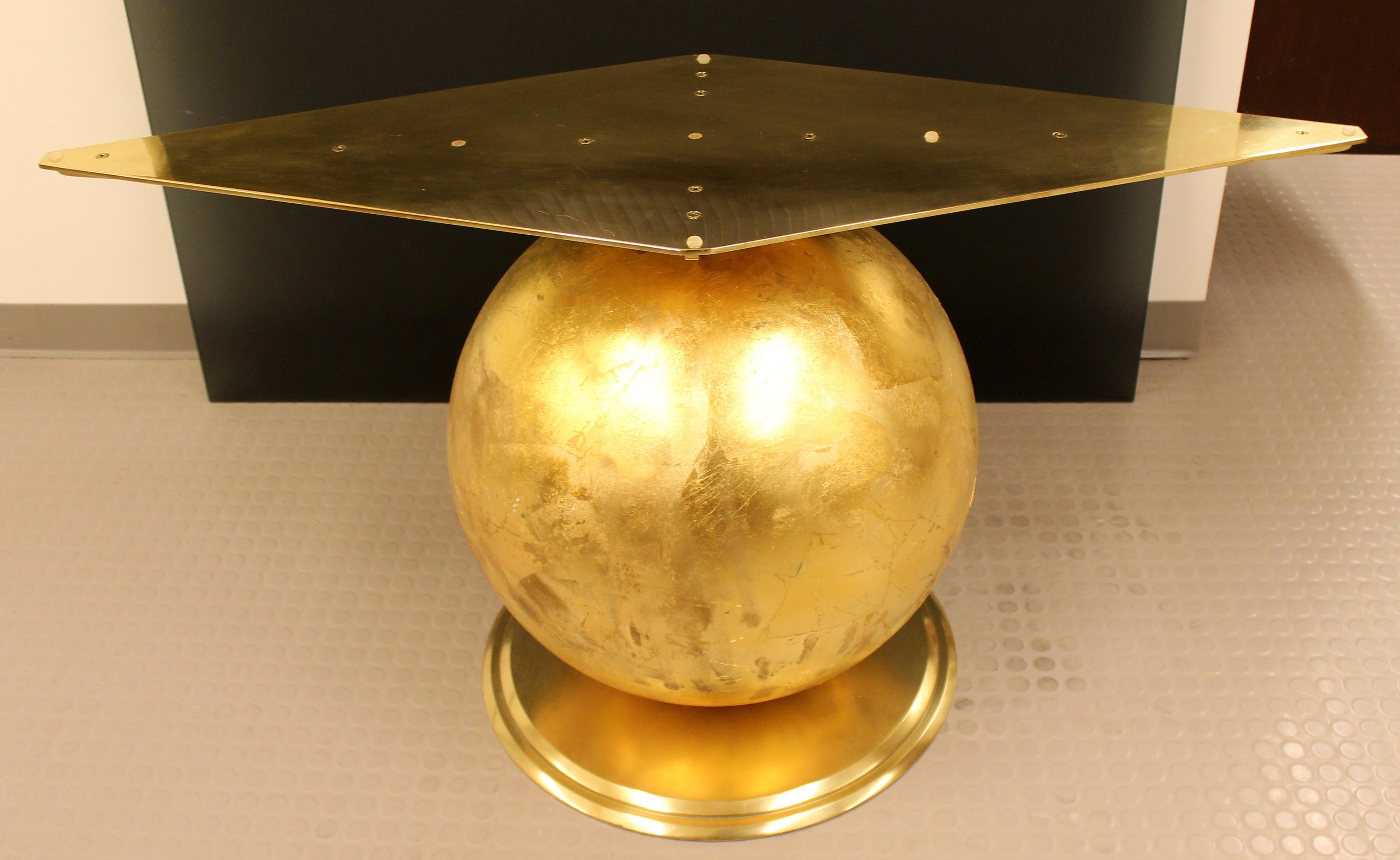 For your consideration is a gorgeous, Hollywood Regency style table base, made of metal and gold leaf. Can be used with glass, smoked glass, marble or travertine. In excellent vintage condition. The dimensions are 54