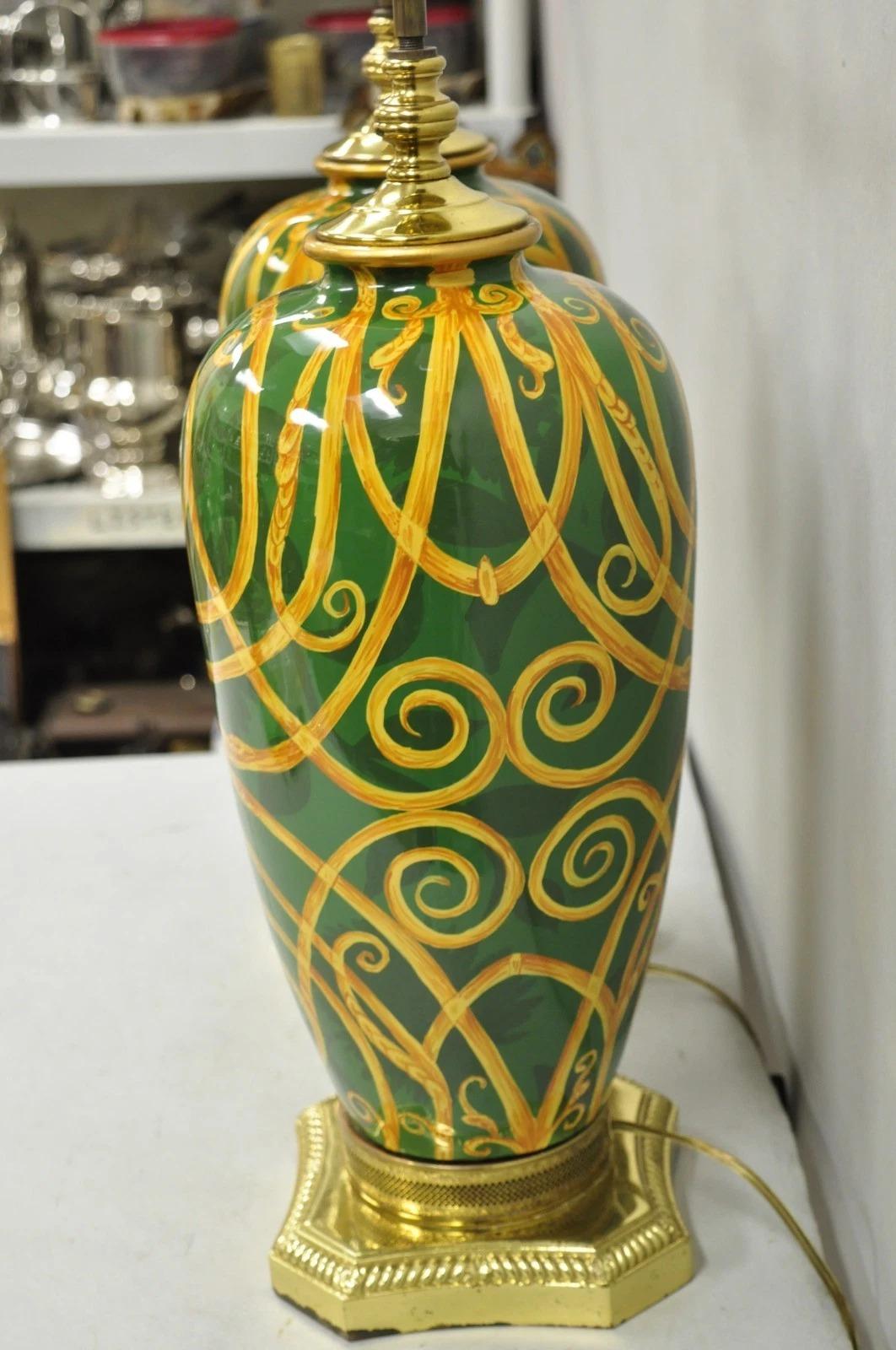 Hollywood Regency Green & Gold Scroll Painted Ceramic Table Lamps - a Pair In Good Condition For Sale In Philadelphia, PA