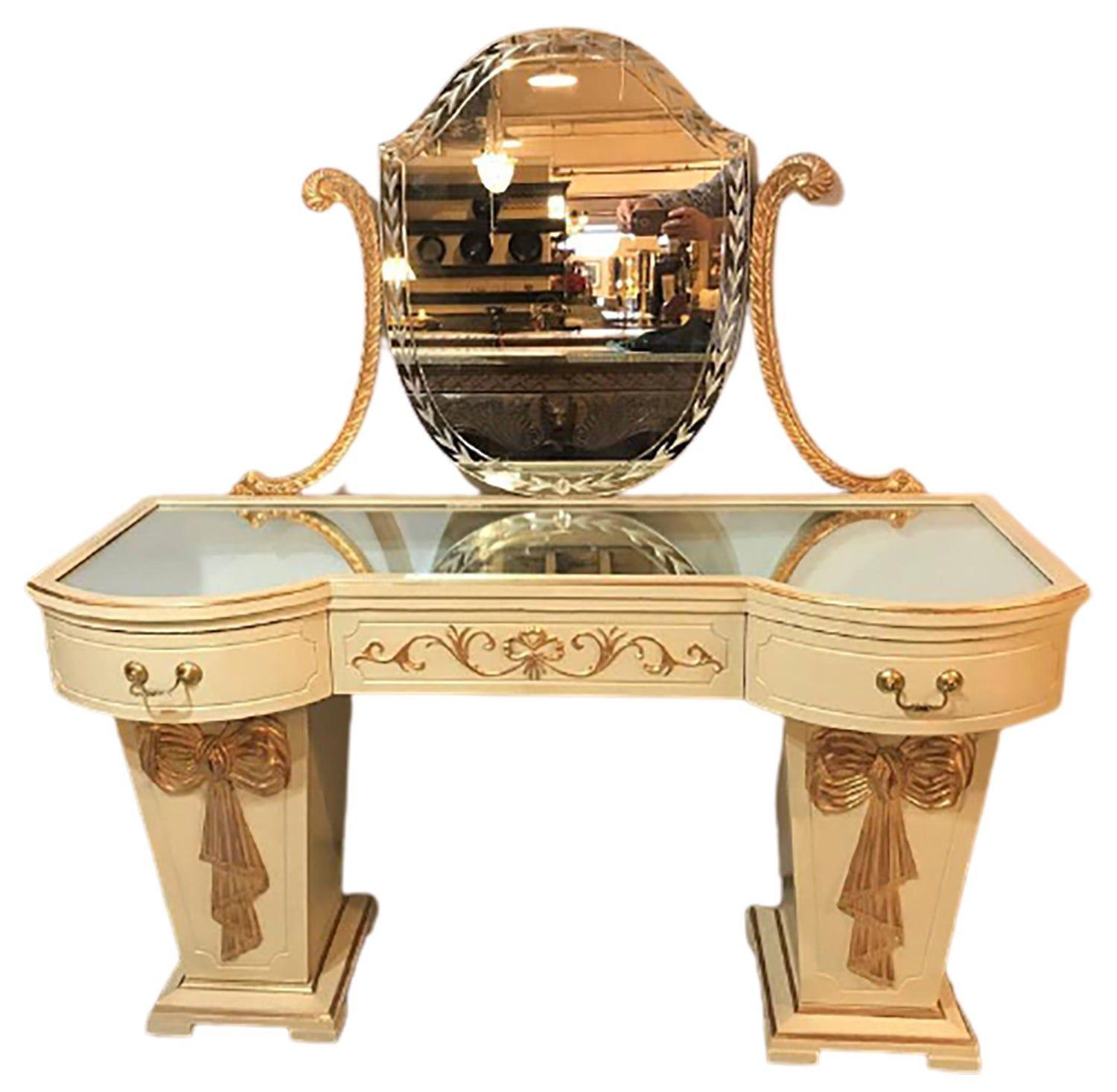 Hollywood Regency Grosfeld House Parcel Paint and Gilt Decorated Vanity or Desk

Grosfeld House parcel paint and gilt decorated vanity or desk with mirror. A fine one of a kind ribbon and tastle solid wood carved writing desk or ladies vanity. The