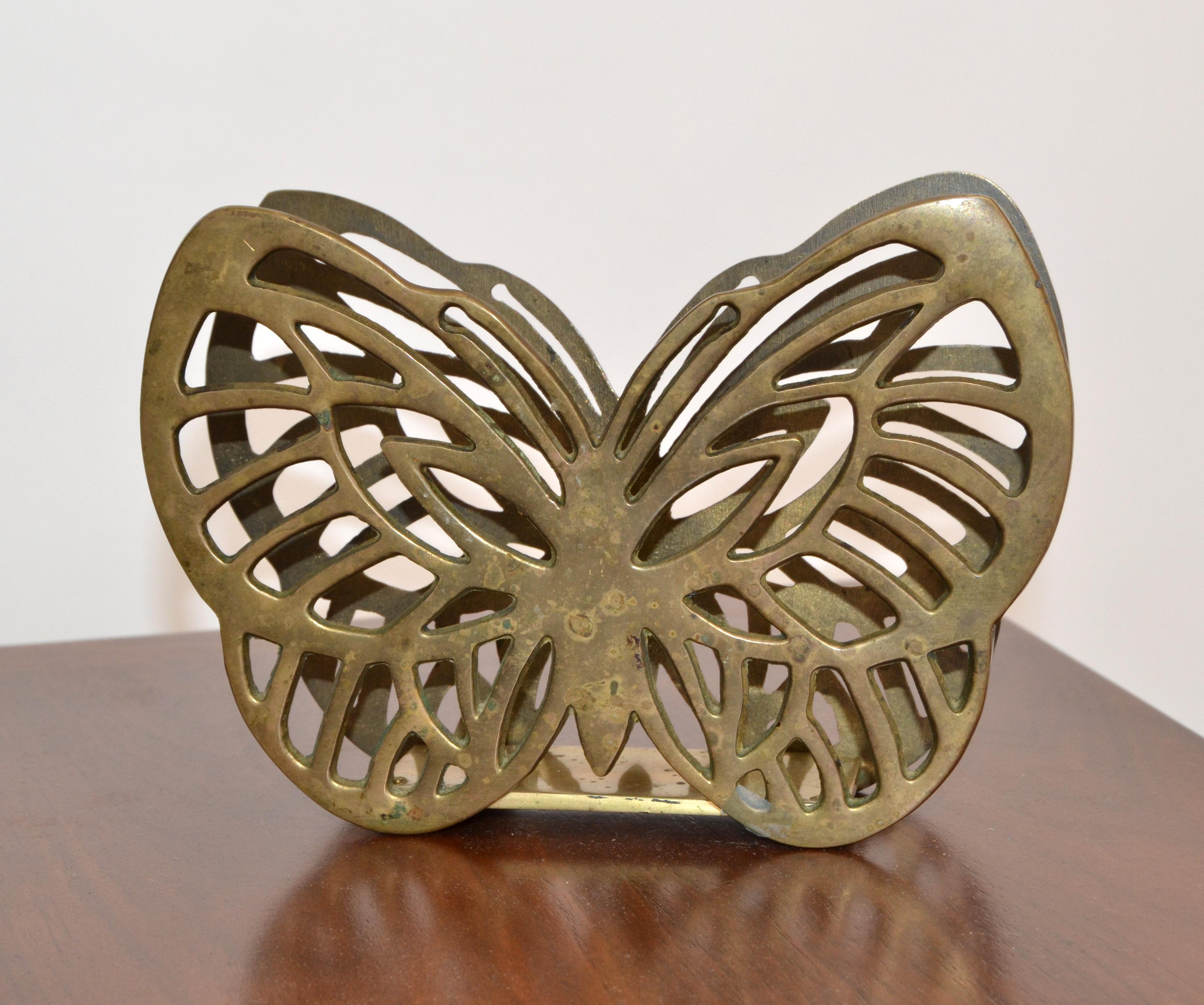 Hollywood Regency Asian Inspired Handcrafted brass butterfly napkin holder, kitchen accessories, tableware. 
Makers Mark at the Base.
Charming Animal Sculpture for Your festive Family Table Setting.
In original vintage condition with patina to
