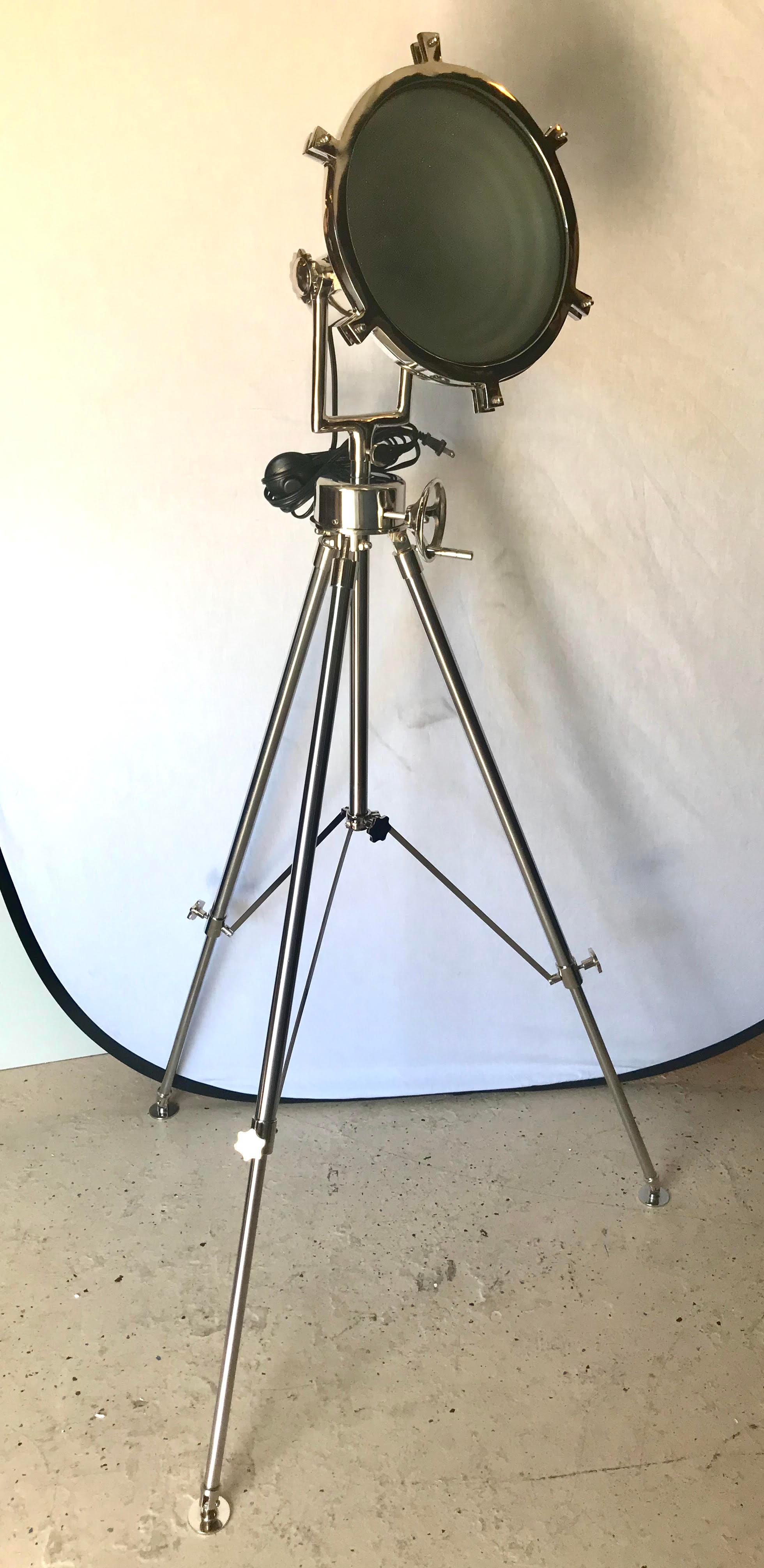 Hollywood Regency style Industrial chrome spotlight floor lamps with chrome tripod stand. Lamp dimensions: 4
