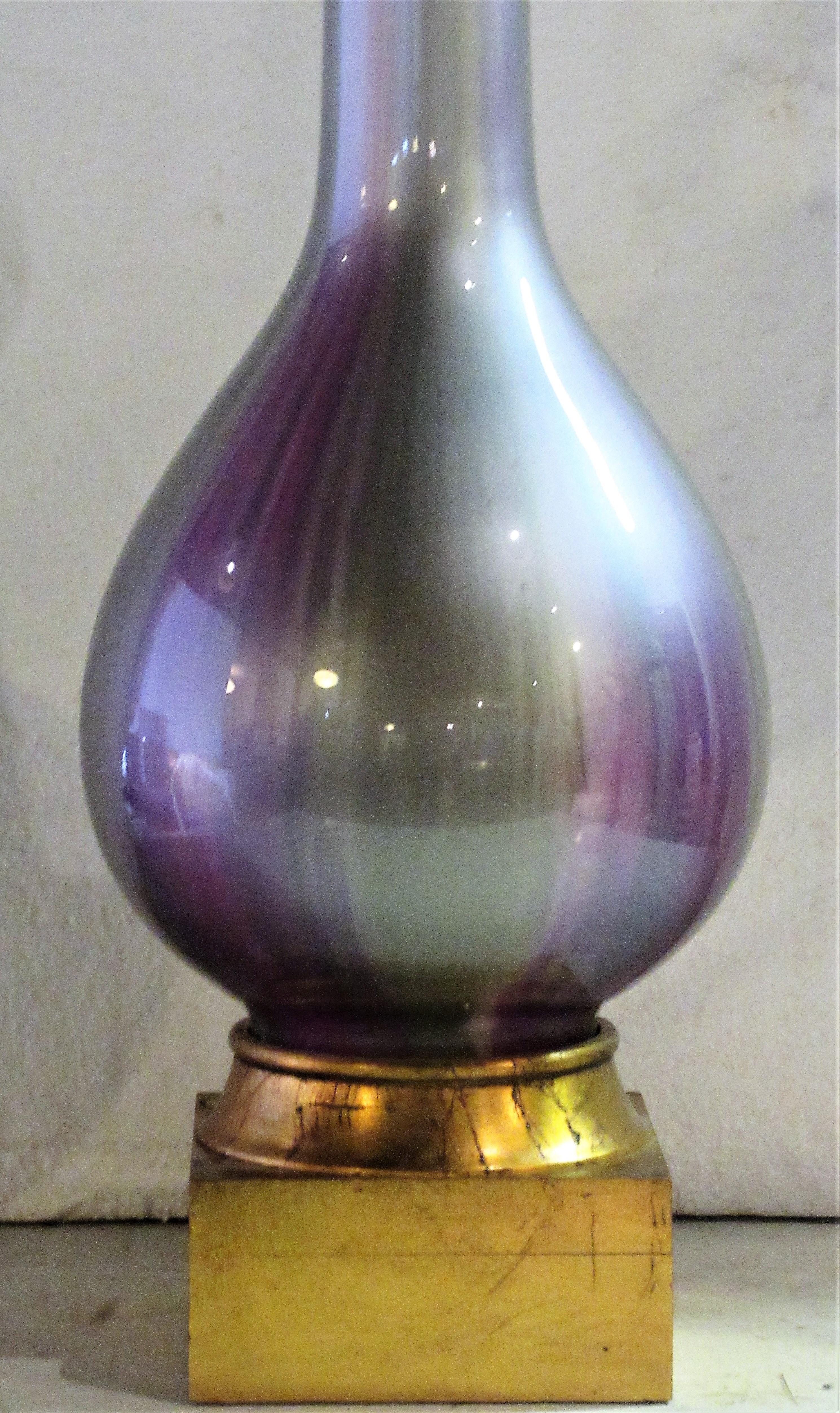 Hollywood Regency silver gray lavender purple iridescent glass lamp with giltwood base by Frederick Cooper, Chicago, circa 1960-1970. A beautiful lamp with a tall elegant form. Look at all pictures and read condition report in comment section.