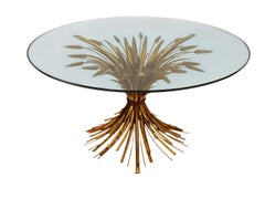 Runder oder runder italienischer Hollywood-Regency-Cocktailtisch aus vergoldetem und vergoldetem Glas
