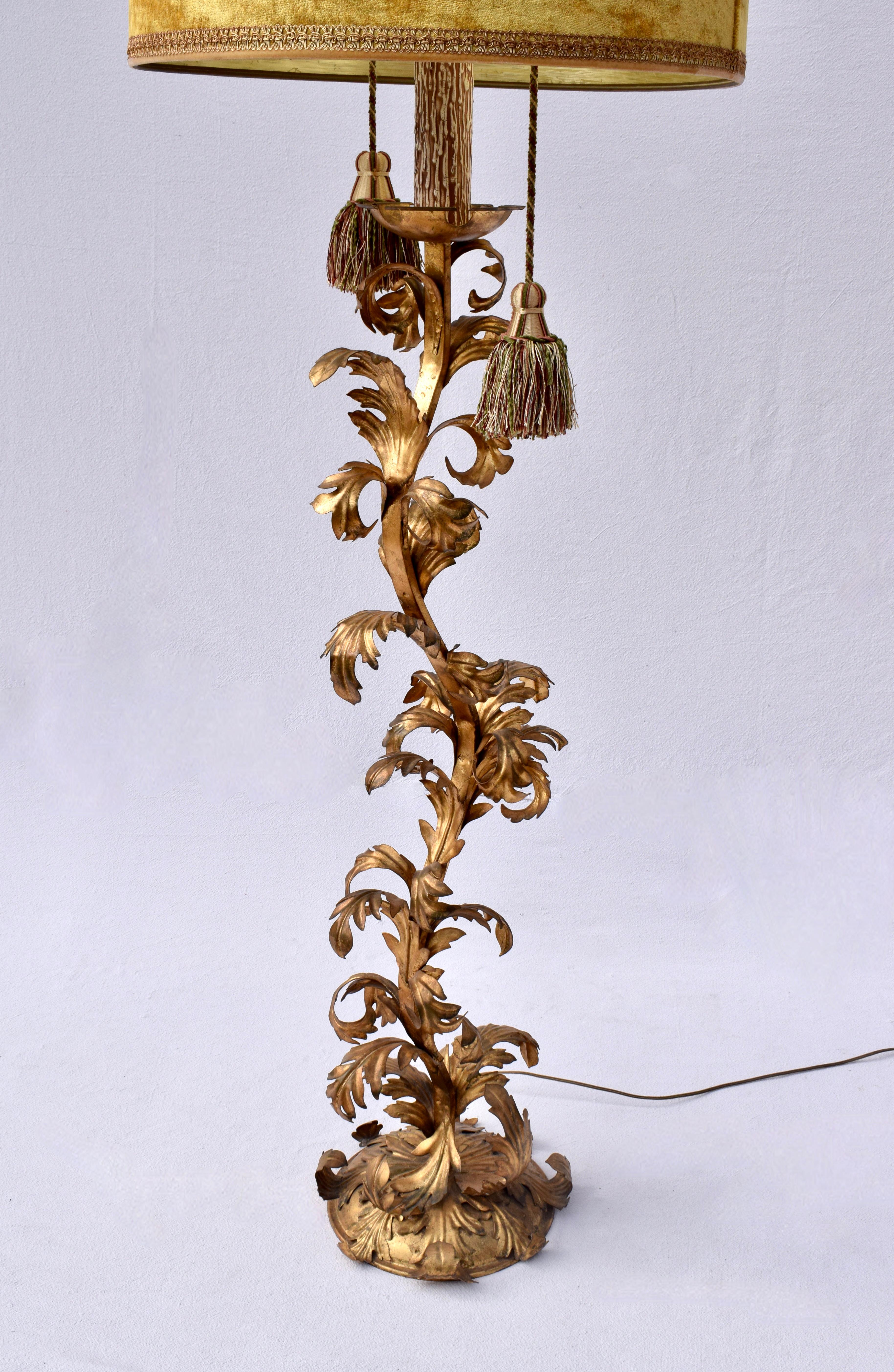 Magnificent Hollywood Regency Italian Gold Gilt Iron Floor Lamp with striking serpentine form  heavily clad with dramatic Acanthus leaves motif. Original Shade & 10