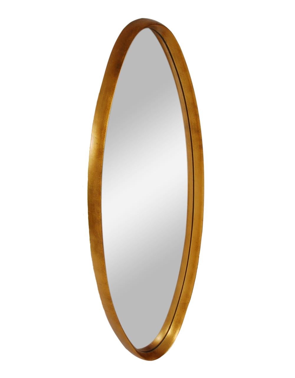 Vintage oval wall mirror from Italy, circa 1960s. It features a thin edge gold gilded wood frame with oval mirror. In very good well cared for condition.